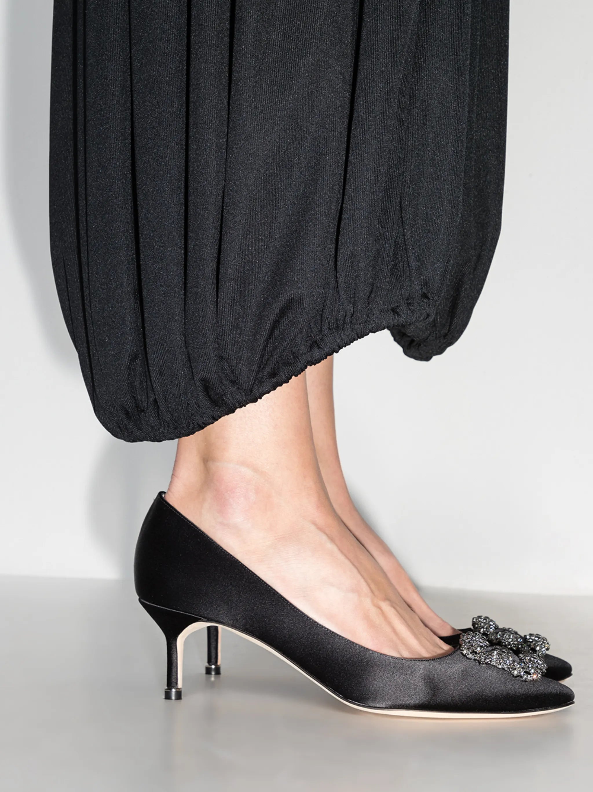 Hangisi crystal-buckle heeled pumps