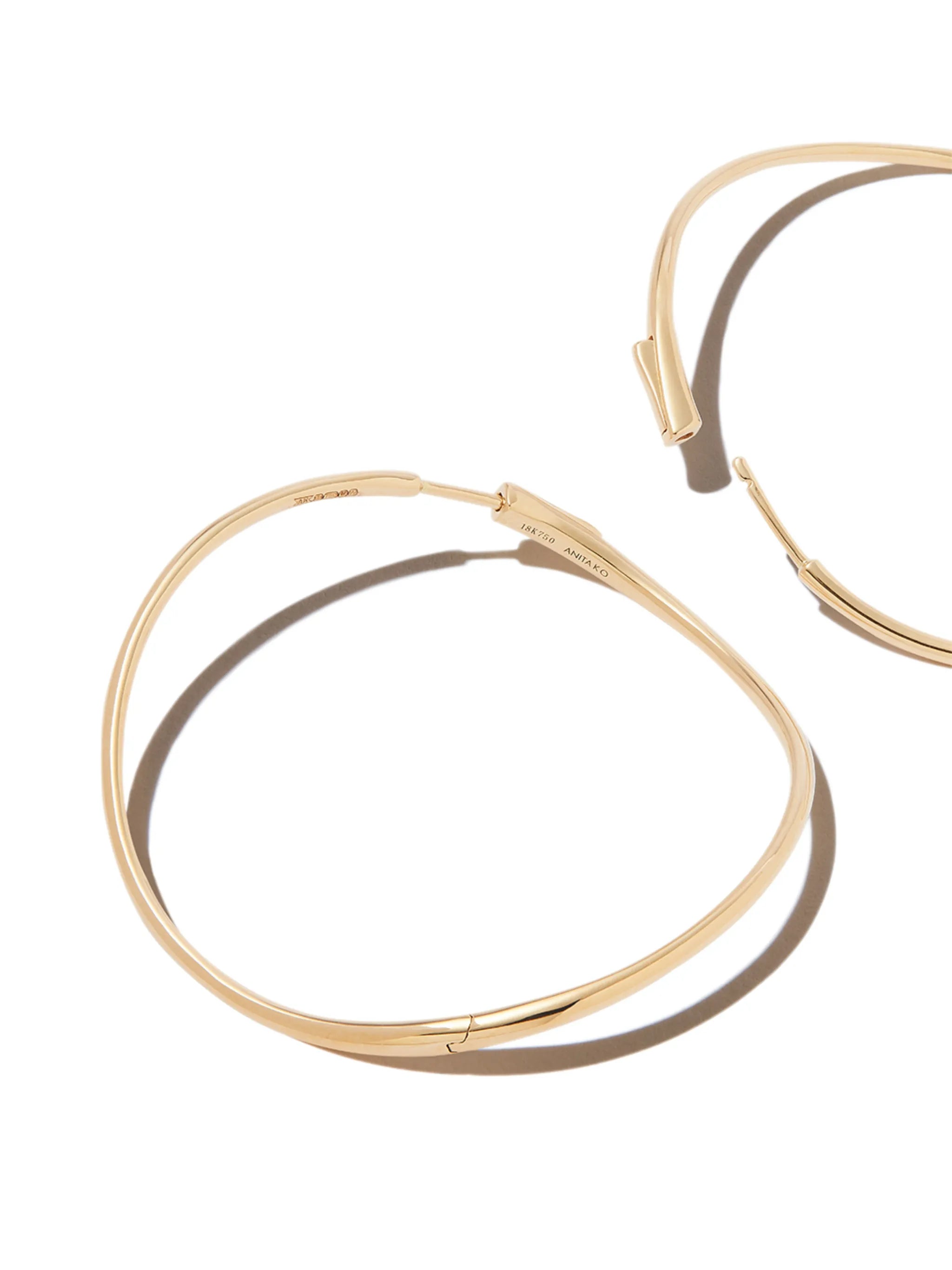 18kt yellow gold Twisted hoop earrings