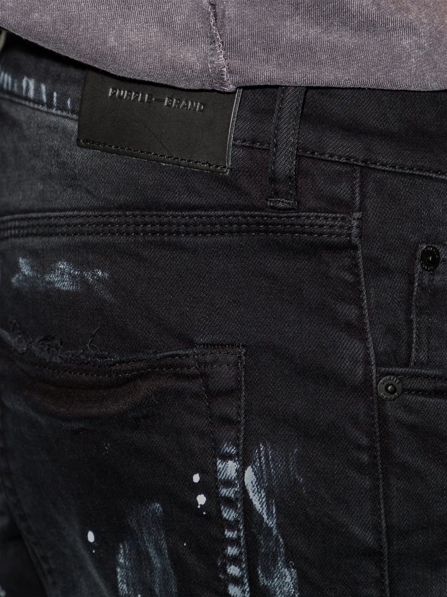 P001 paint-splatter distressed jeans