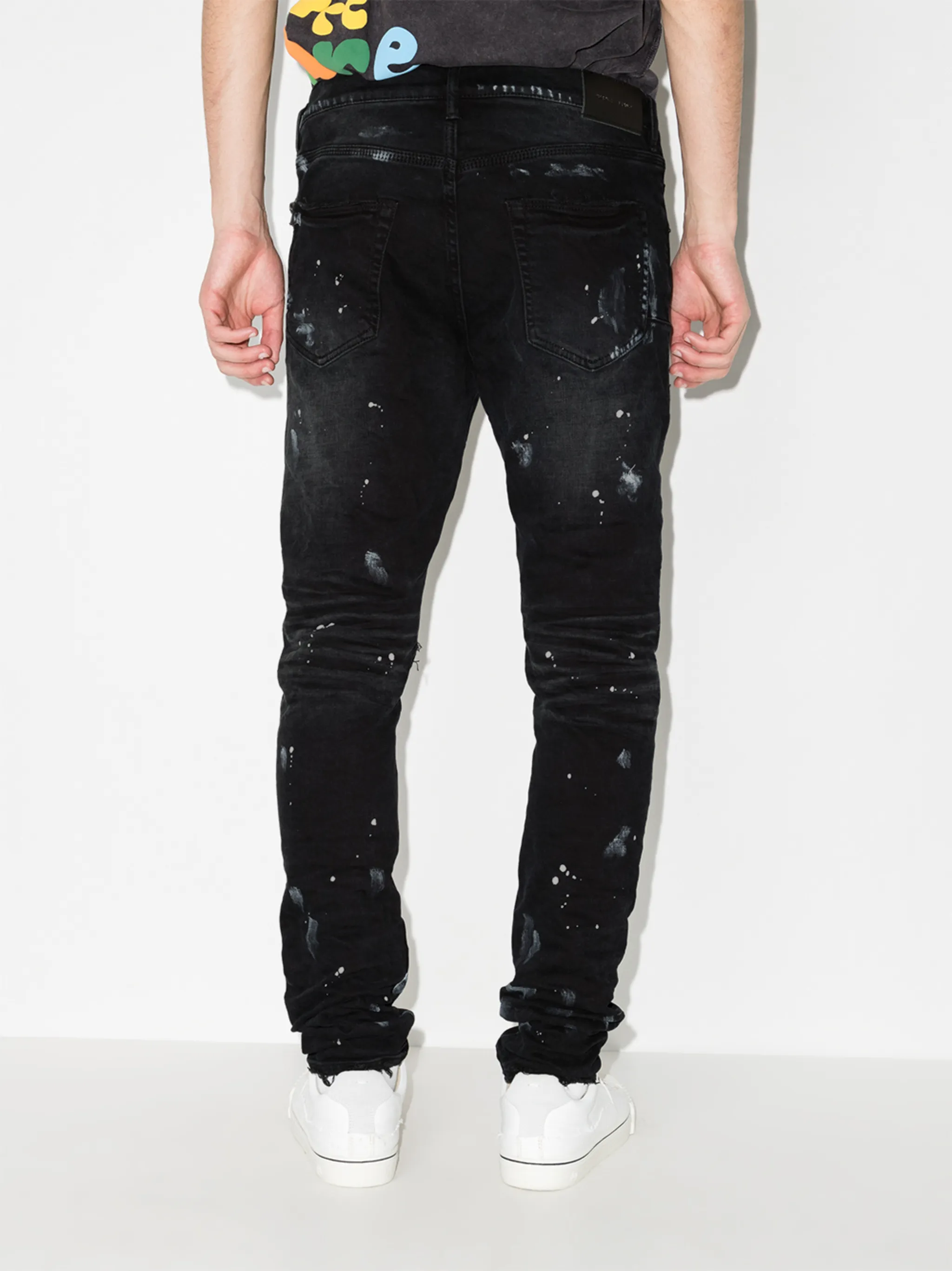 P001 paint-splatter distressed jeans