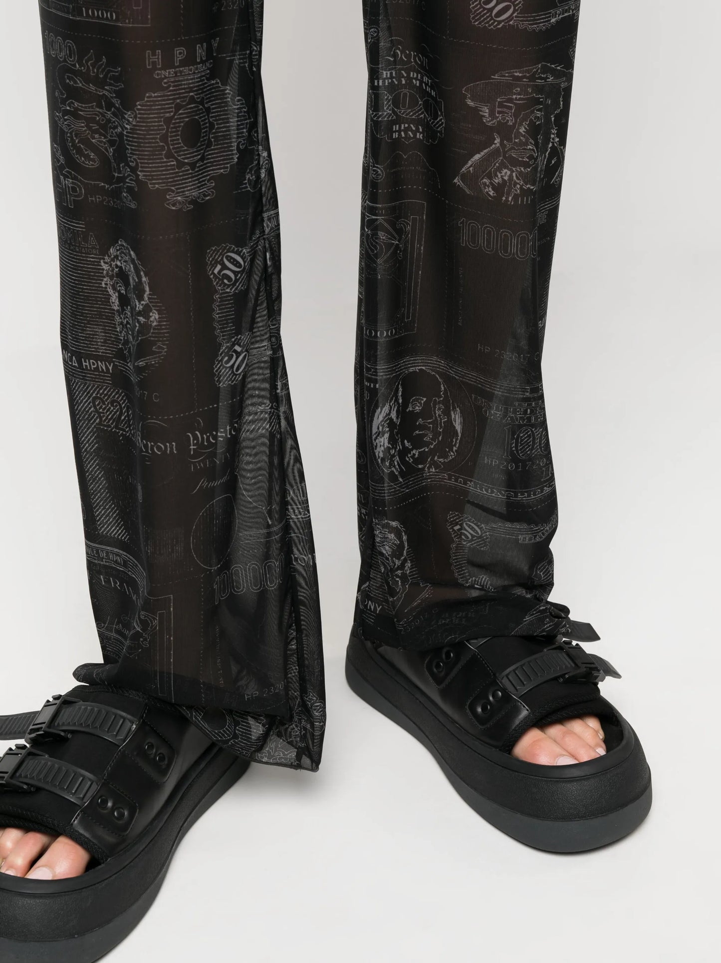 Currency-print mesh trousers