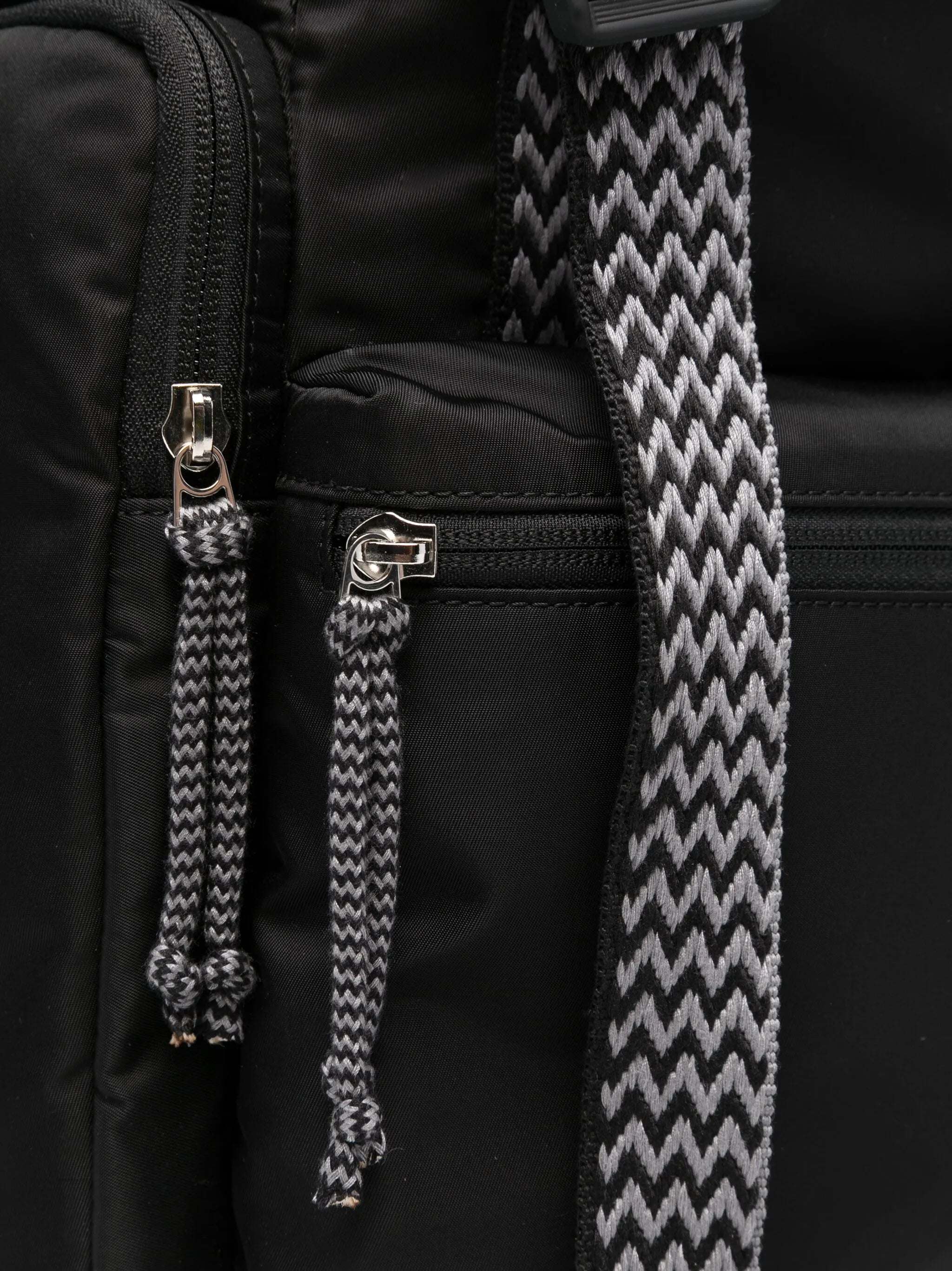 Curb strap-detail backpack