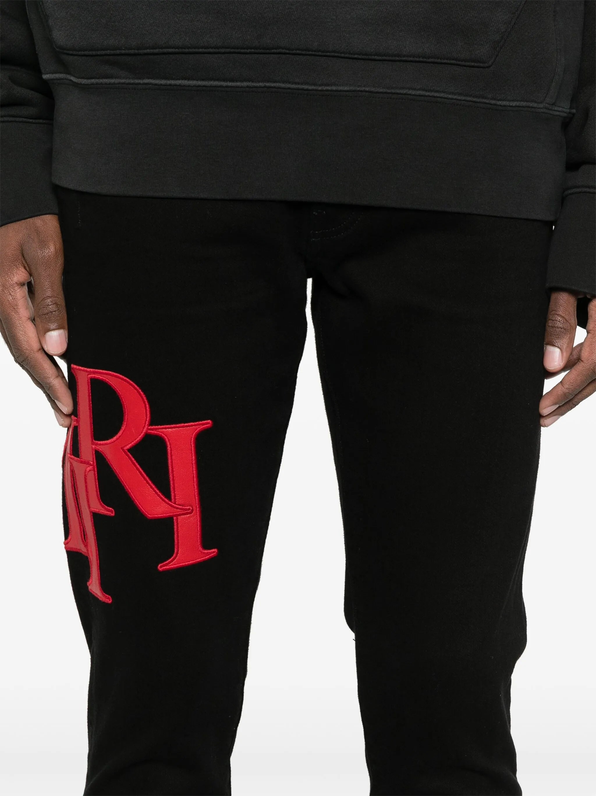 staggered-logo jeans