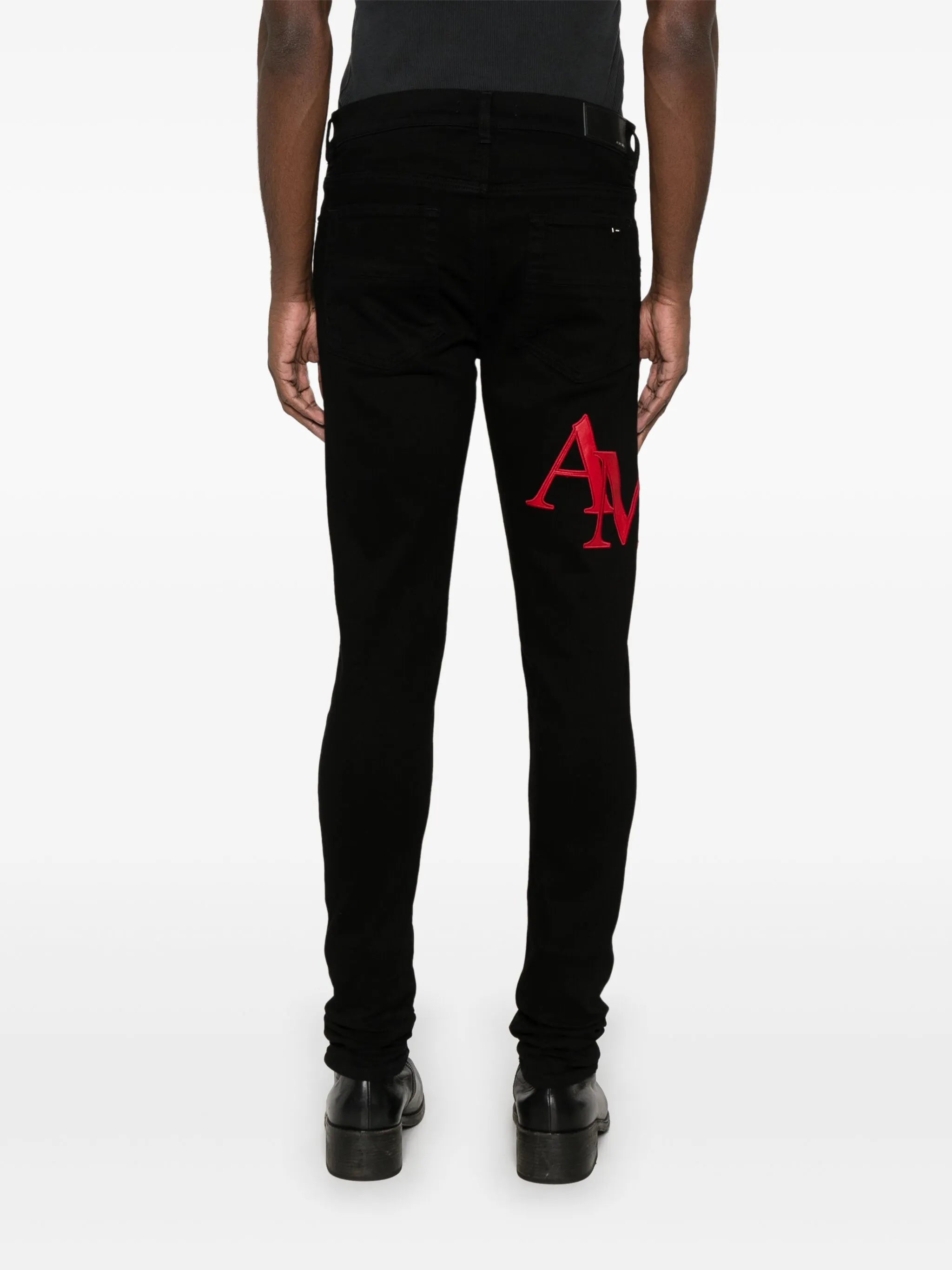 staggered-logo jeans