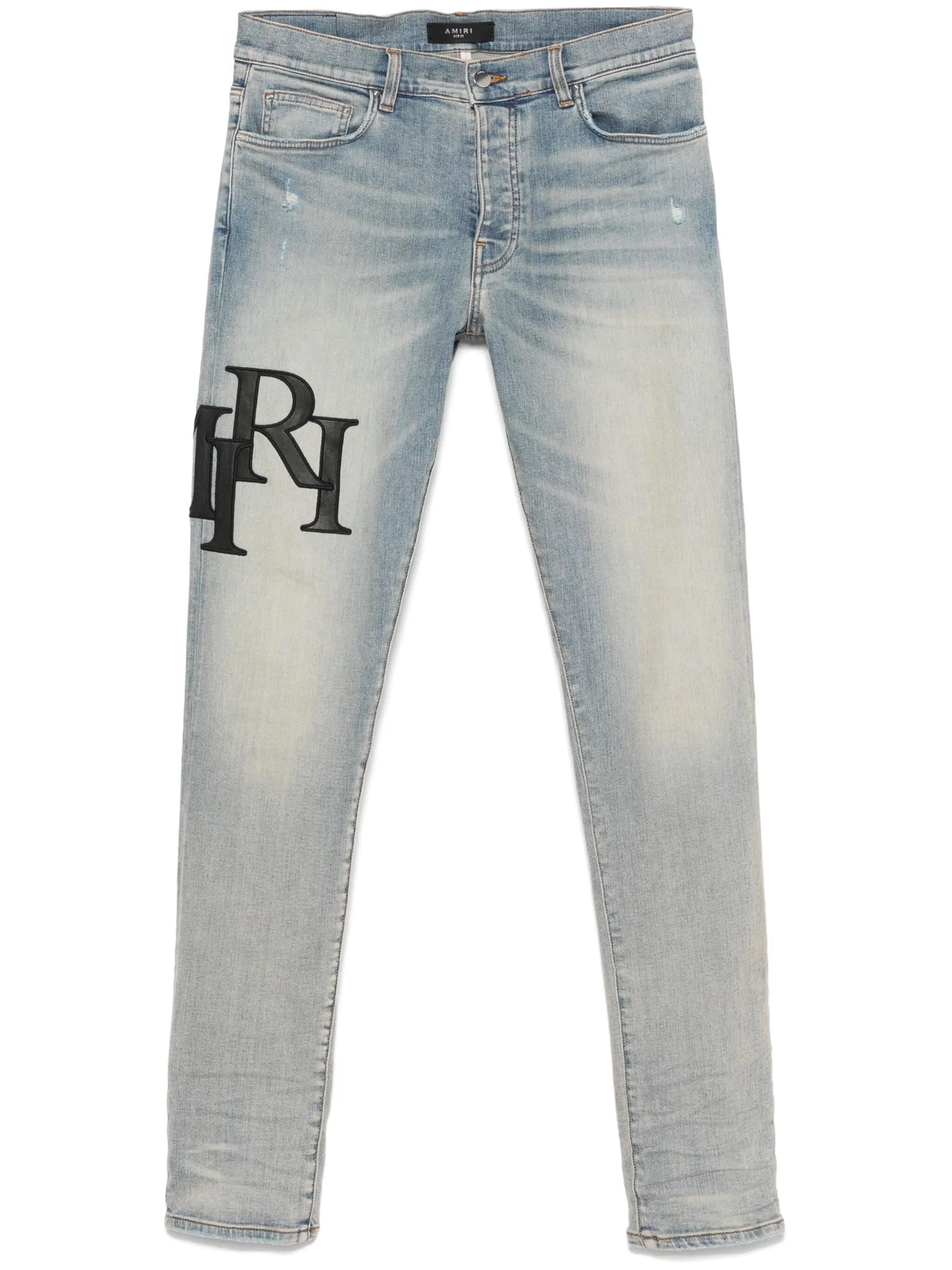 Staggered logo skinny jeans