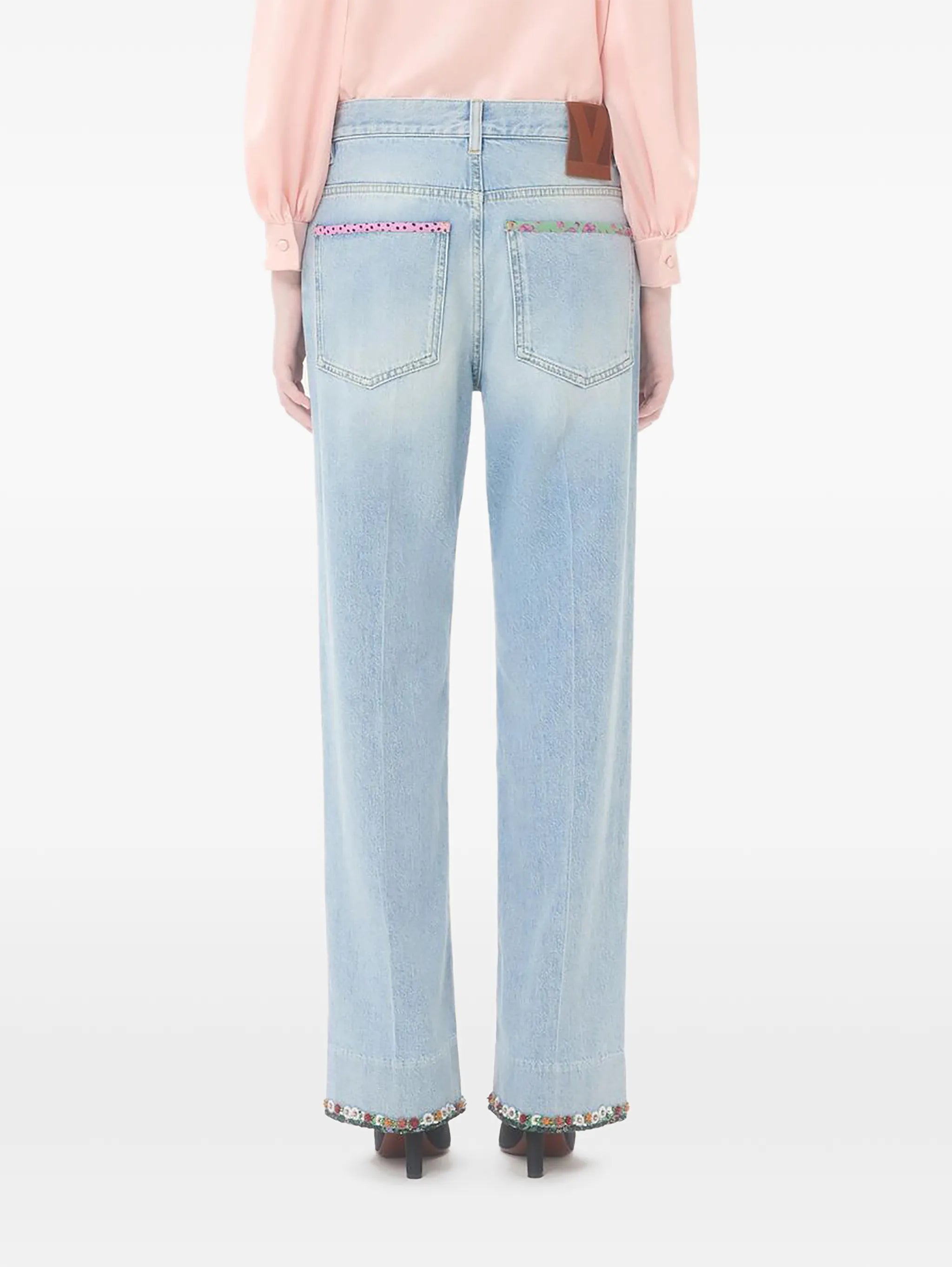 floral-hem faded jeans