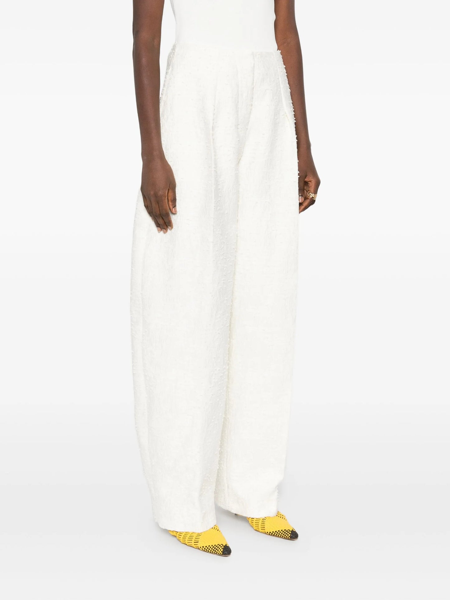 Curvo tweed trousers