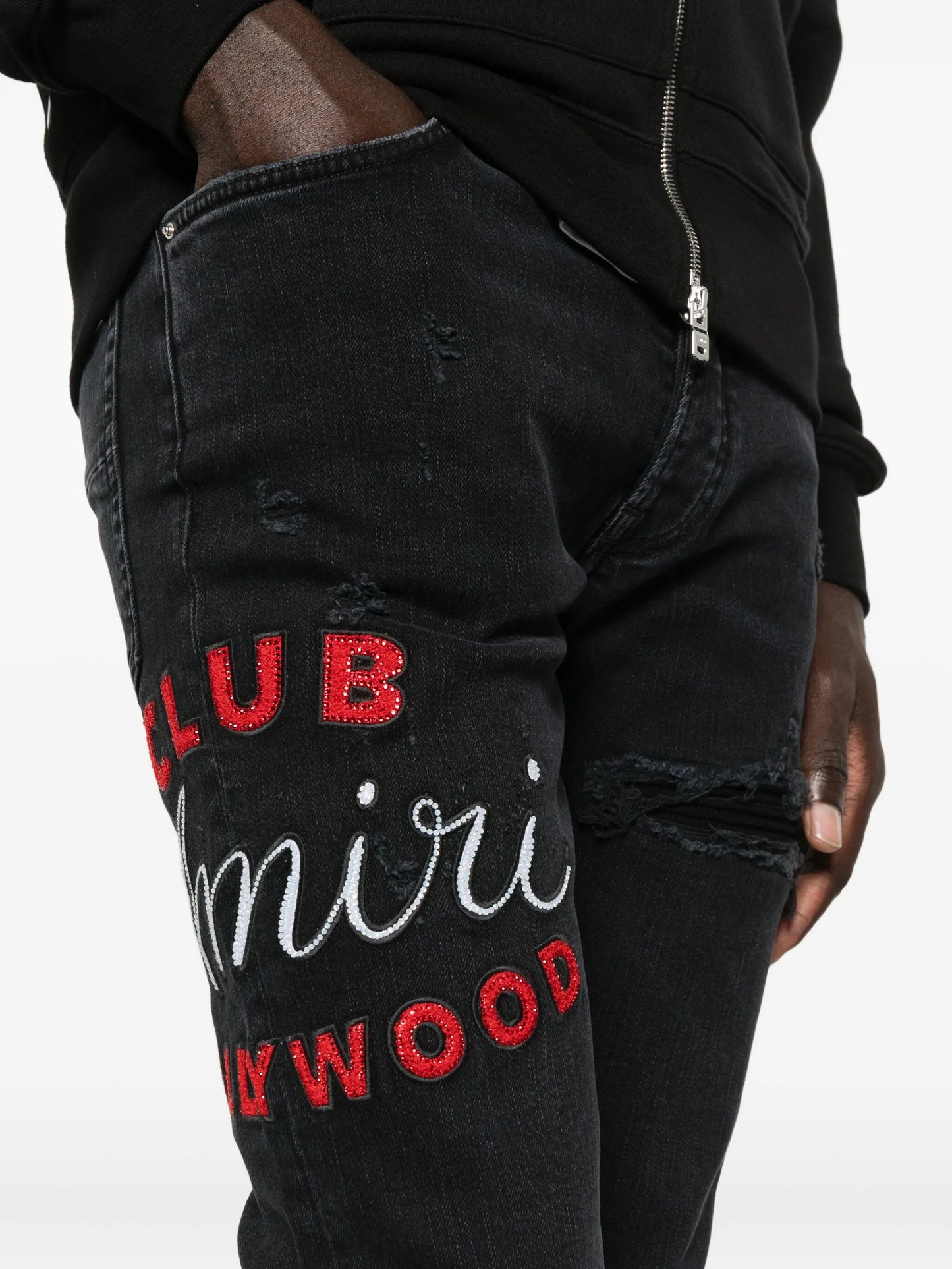 Club MX1 distressed denim jeans