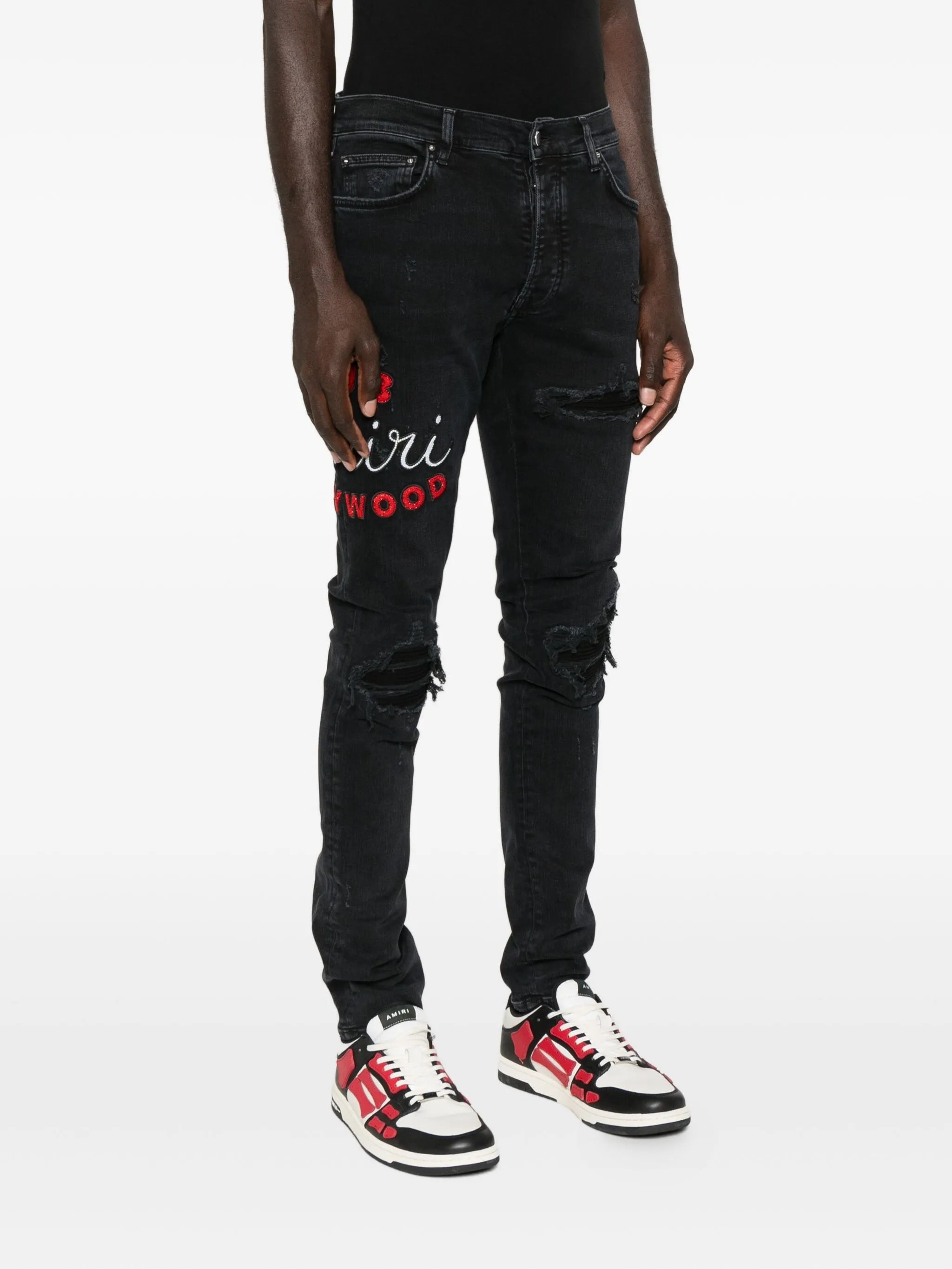 Club MX1 distressed denim jeans