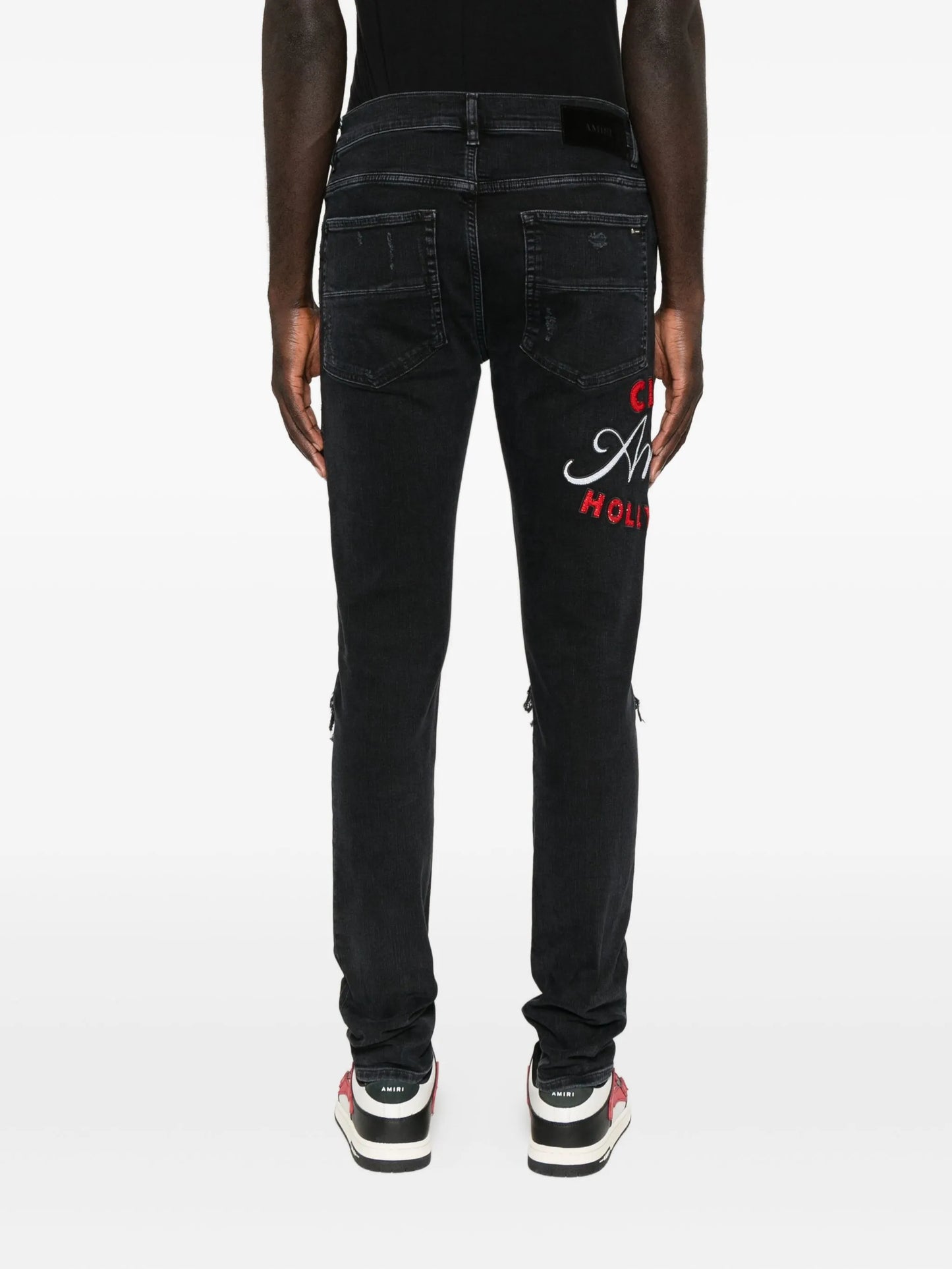 Club MX1 distressed denim jeans