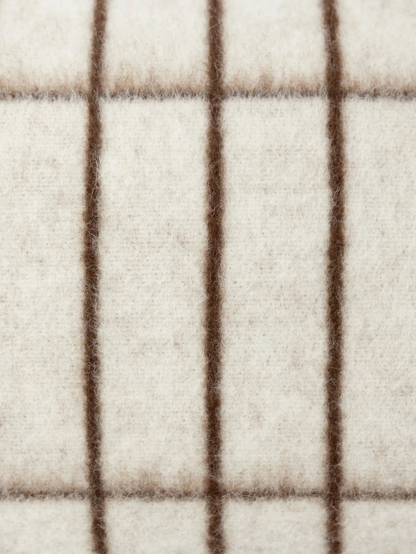 grid-pattern wool cushion
