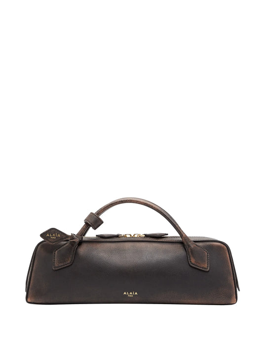 Le Teckel handle leather clutch bag