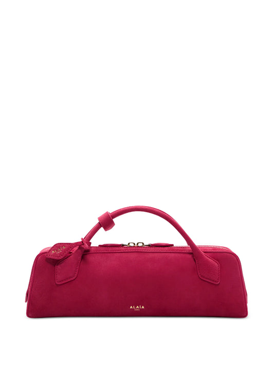 Le Teckel suede clutch bag