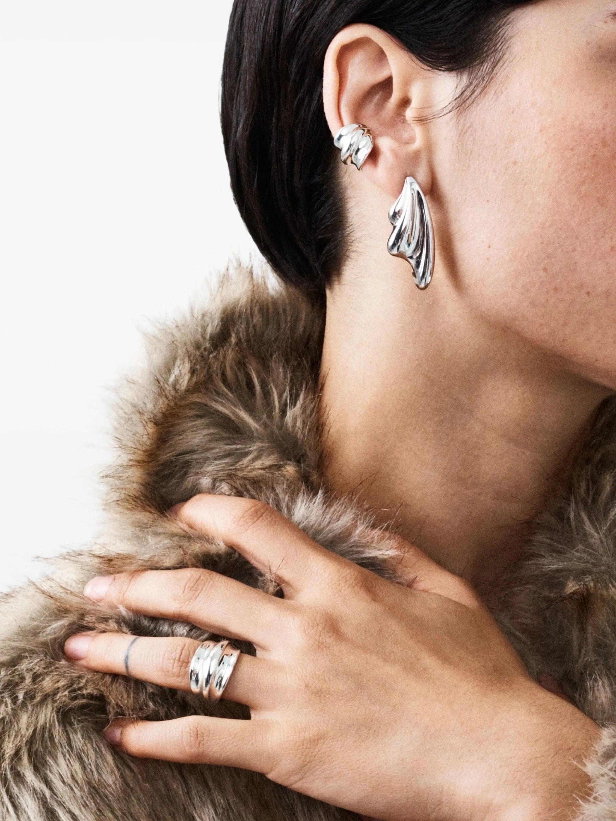 statement wave silver earrings