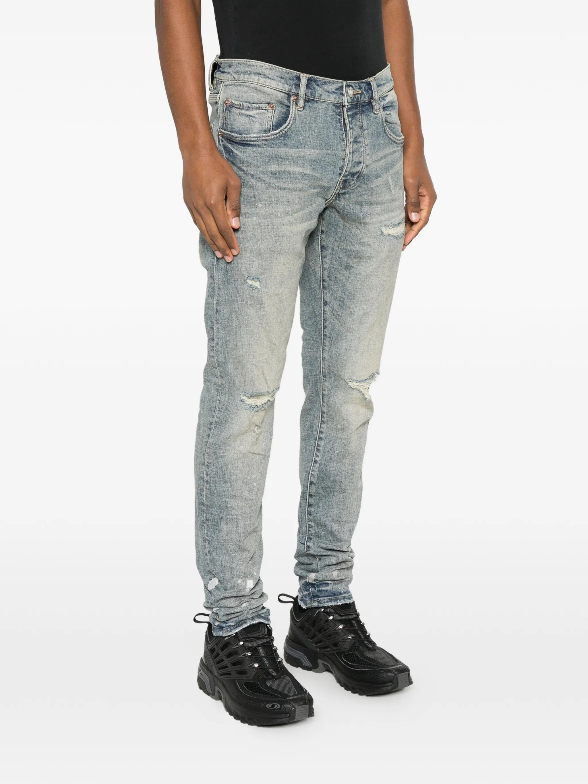 slashed paint jeans