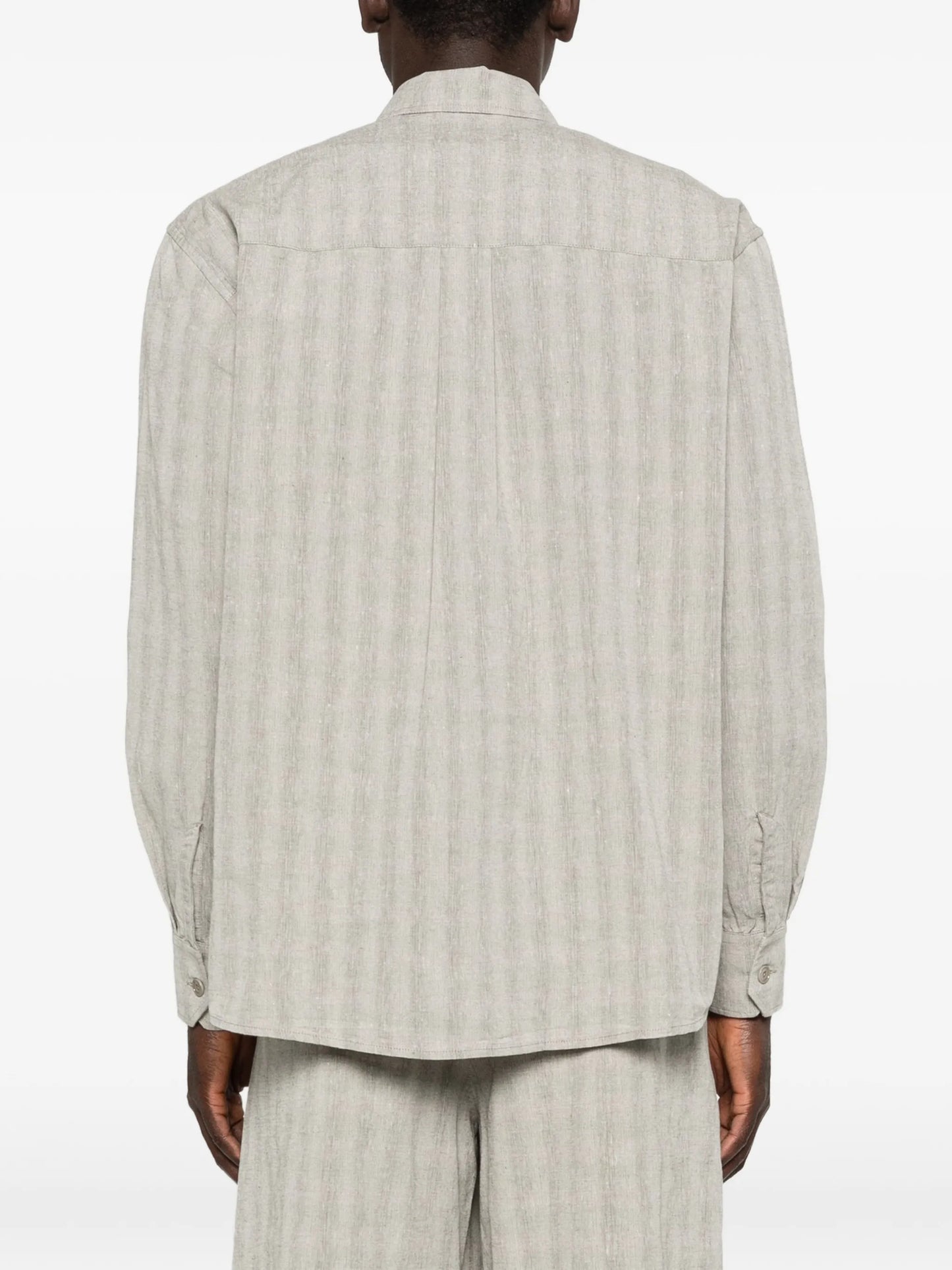 Above striped-pattern shirt