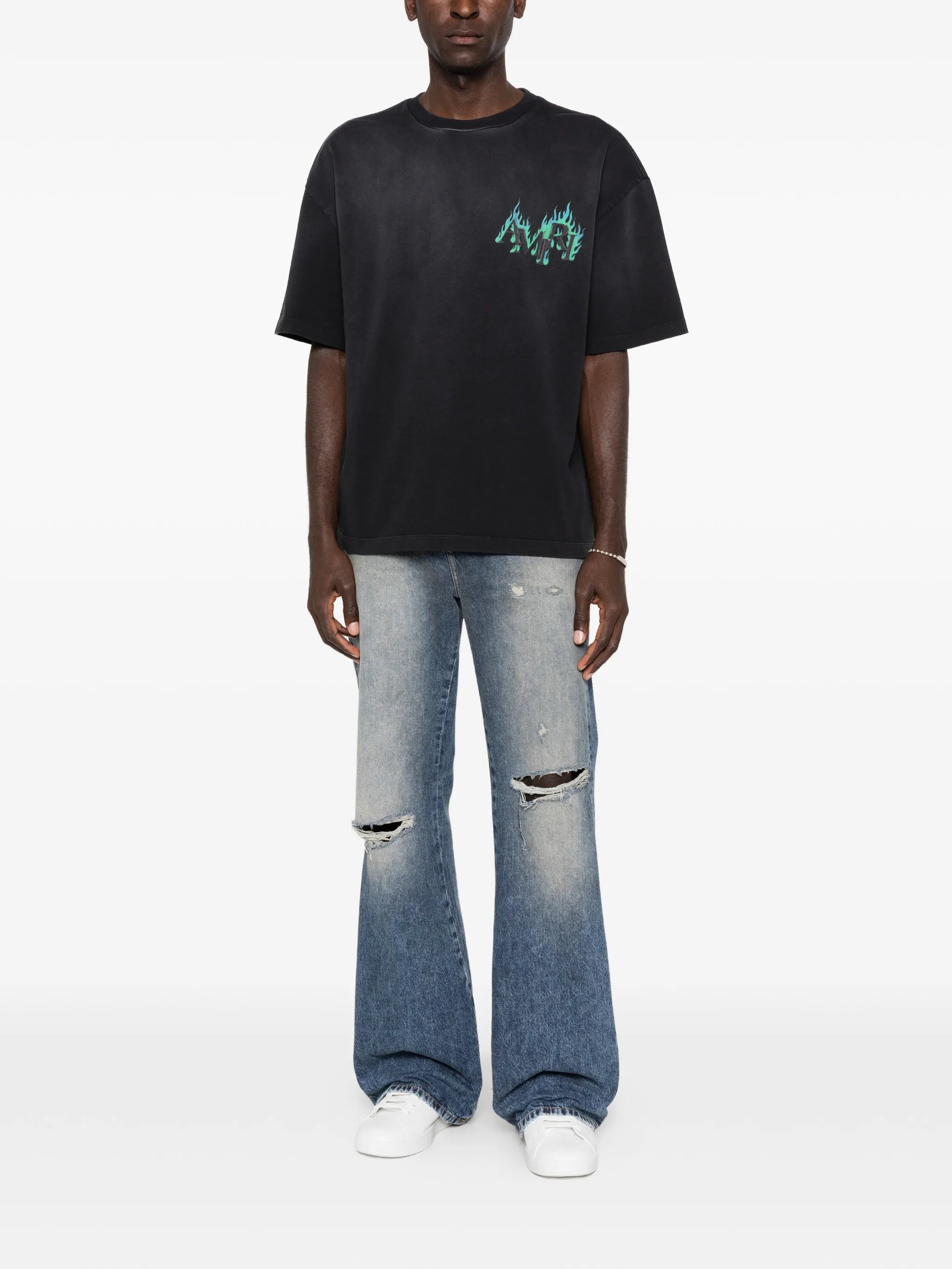ripped-knees bootcut jeans