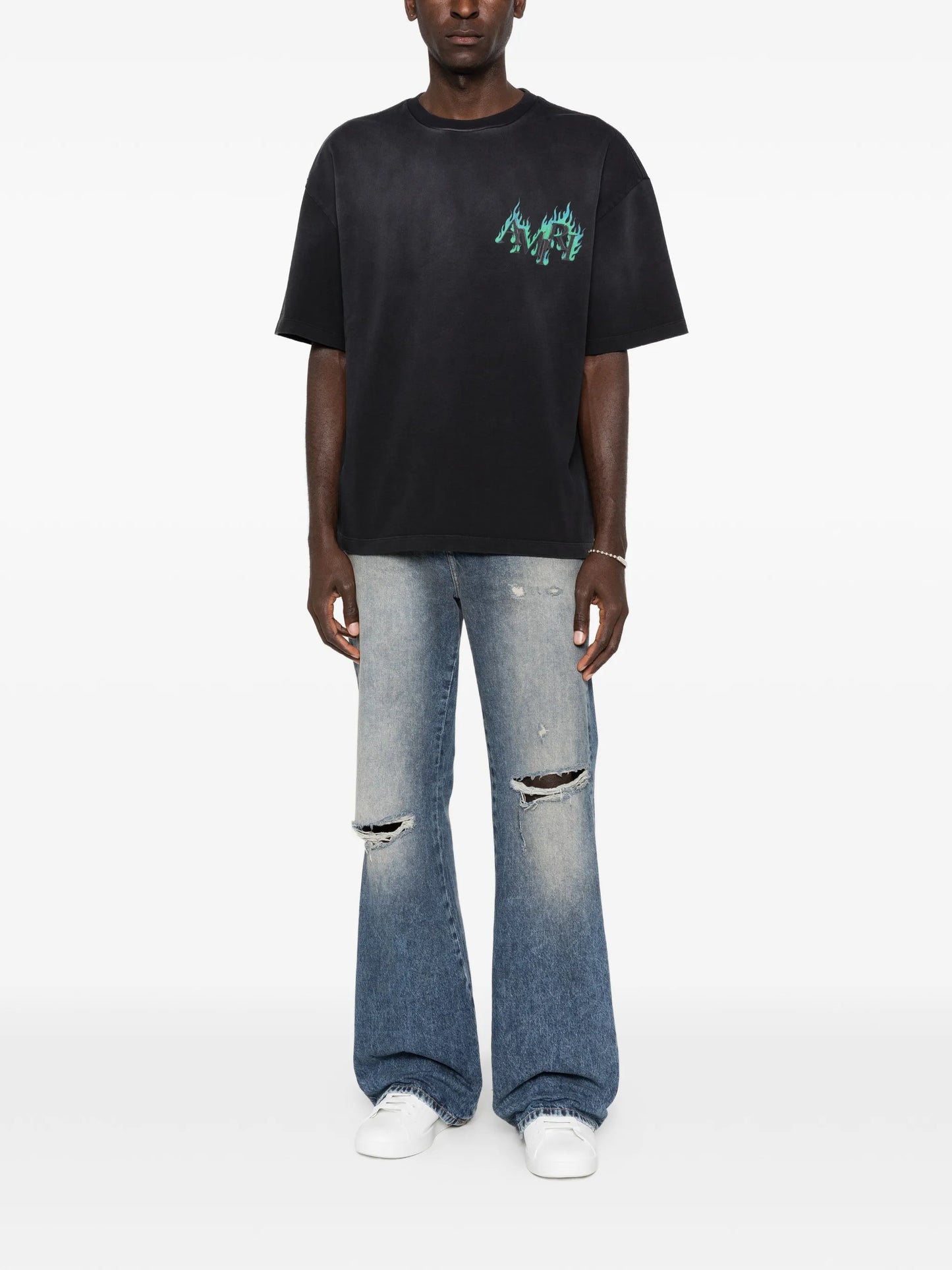 ripped-knees bootcut jeans