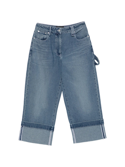 strap-ebellished jeans