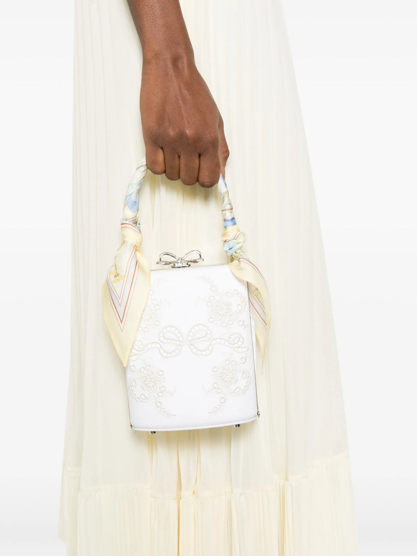 bow-detail clutch bag