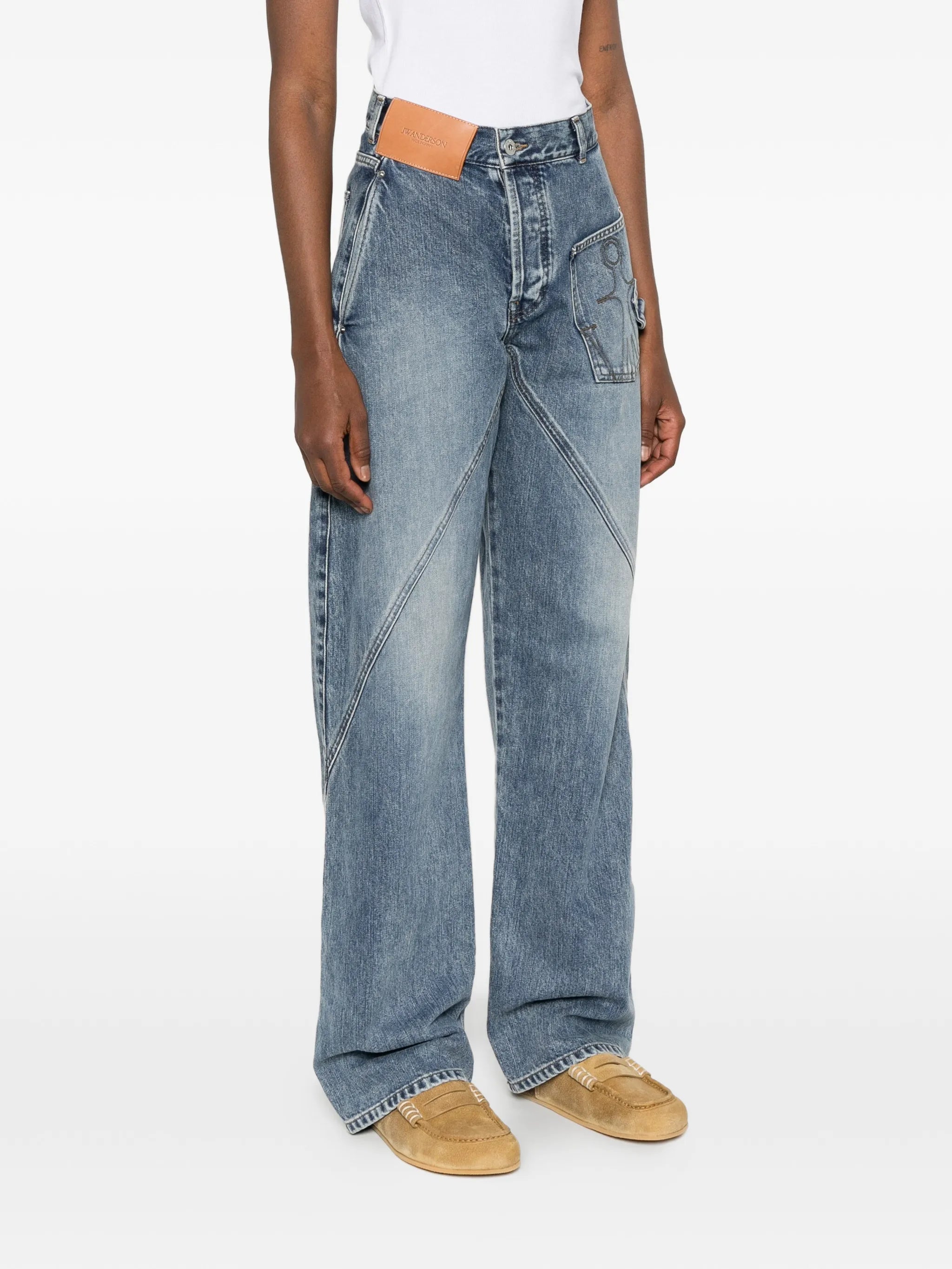 twisted-effect logo-patch denim jeans