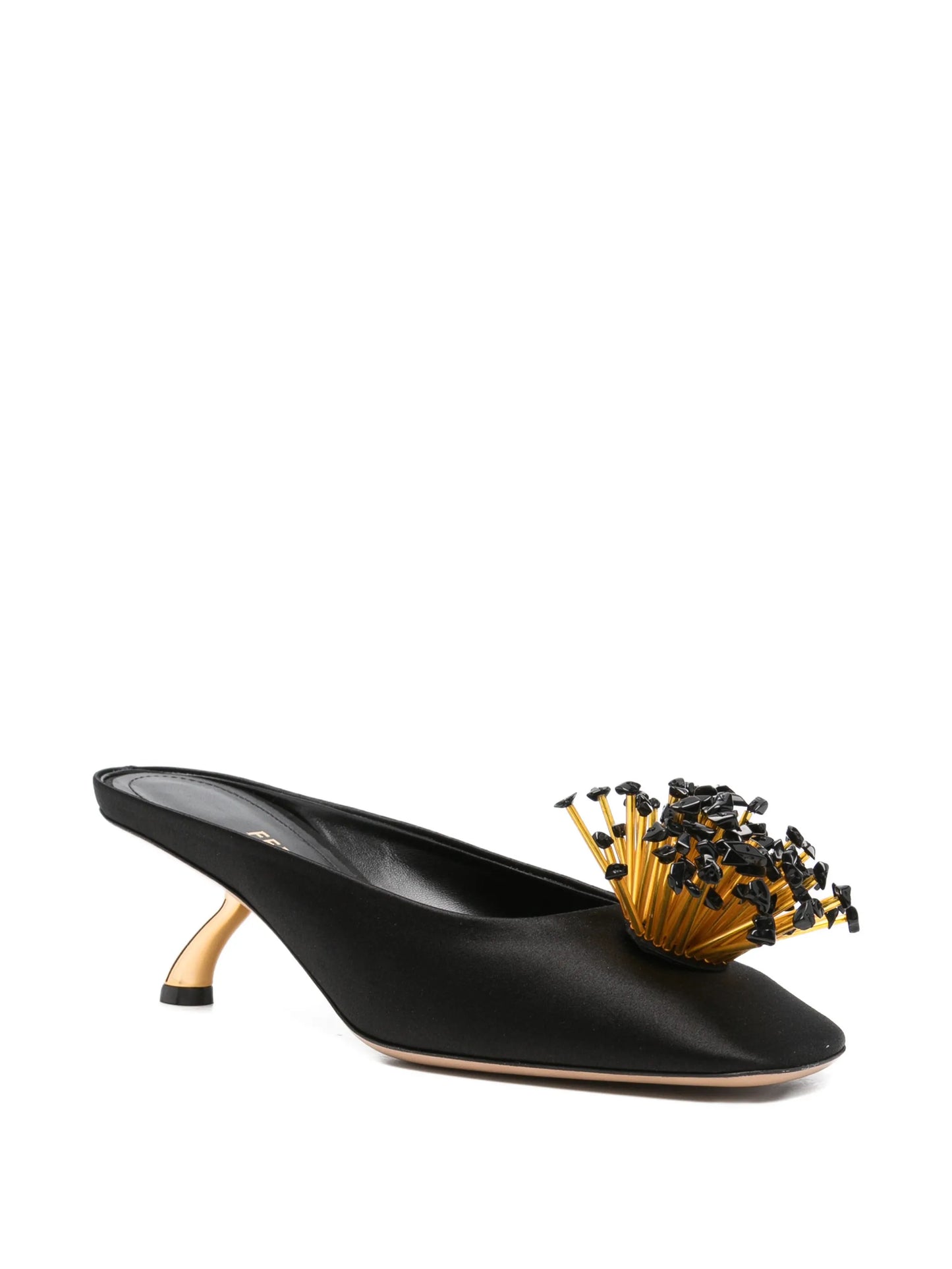 S-shaped heel mules