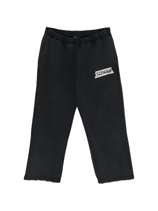 masking-tape track pants