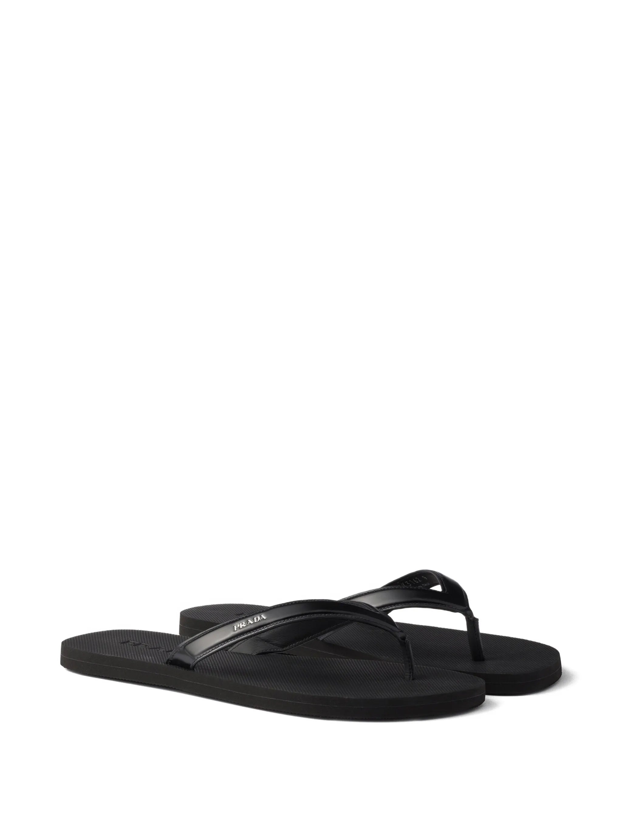 logo-embossed leather flip-flop sandals