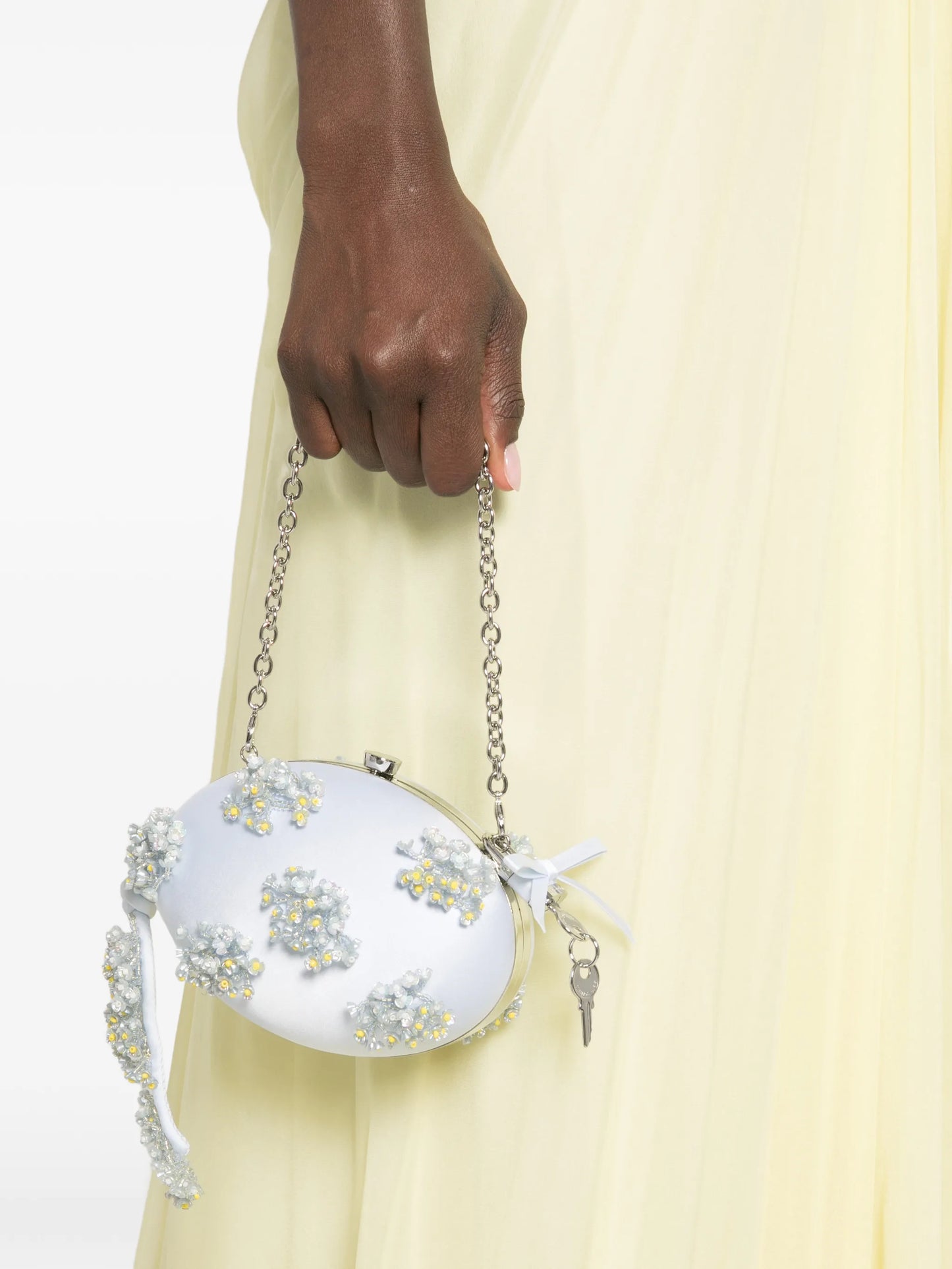 floral-beaded clutch bag