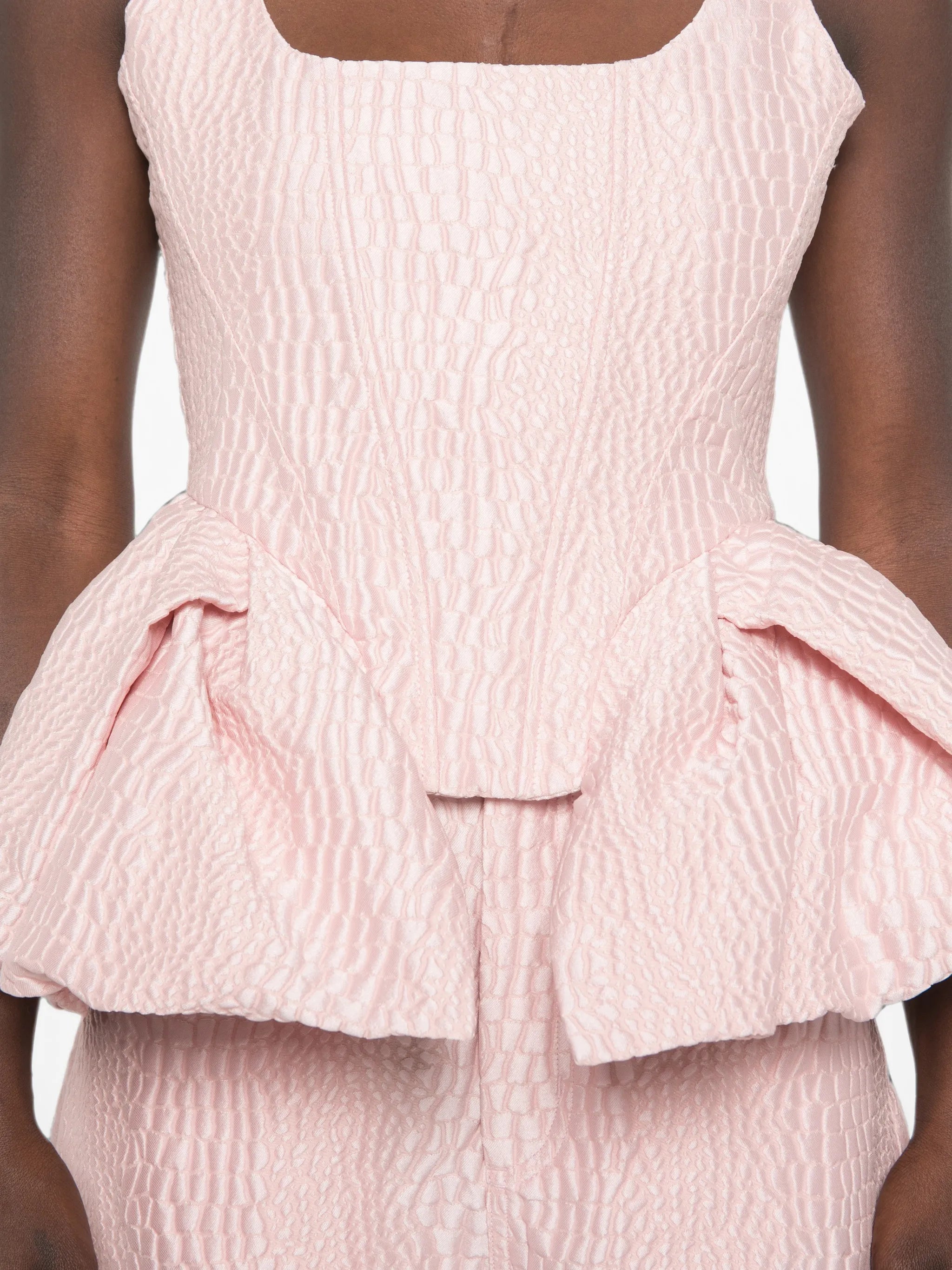 peplum-hem top