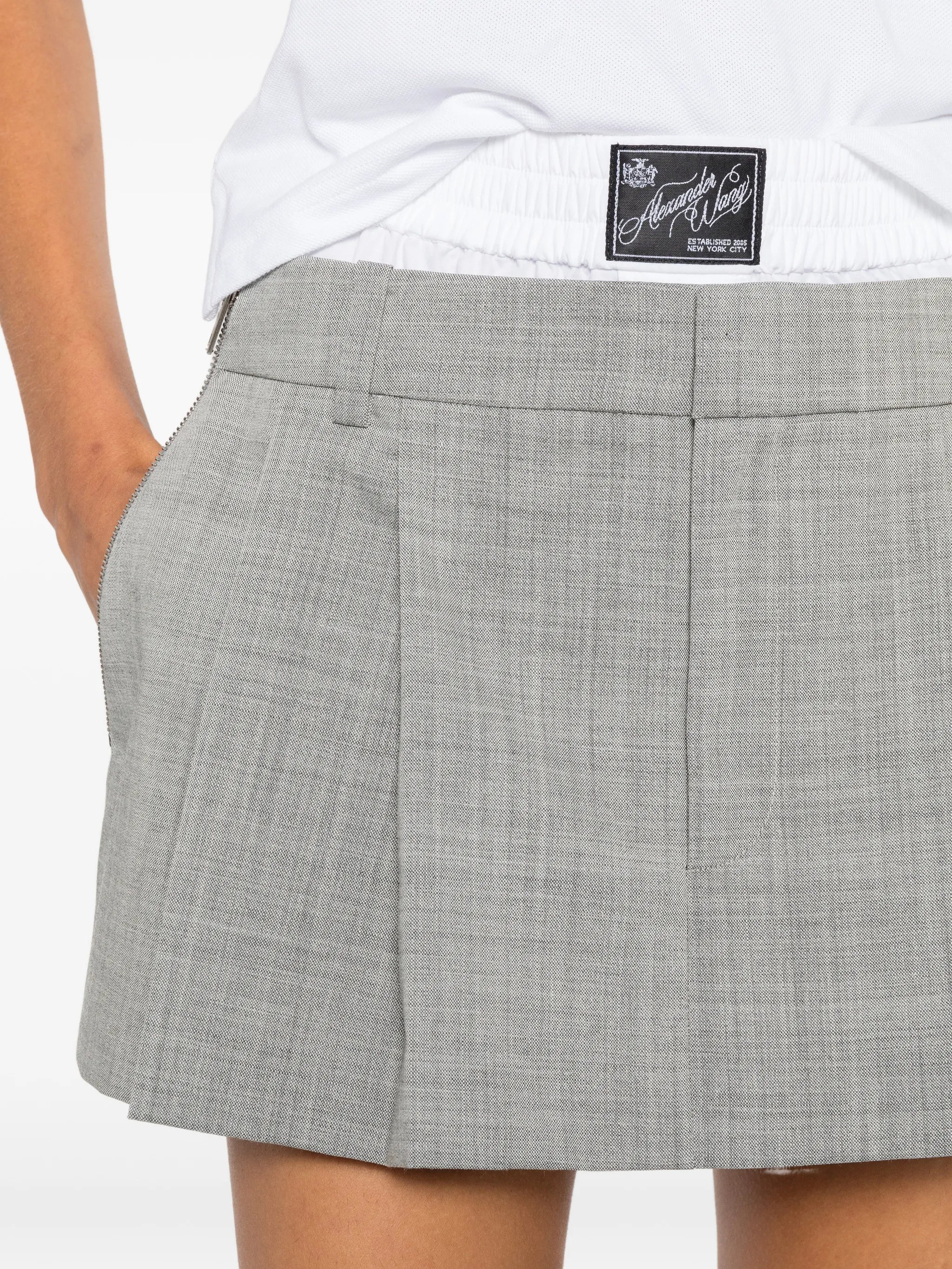 pleated layered-waistband mini skirt