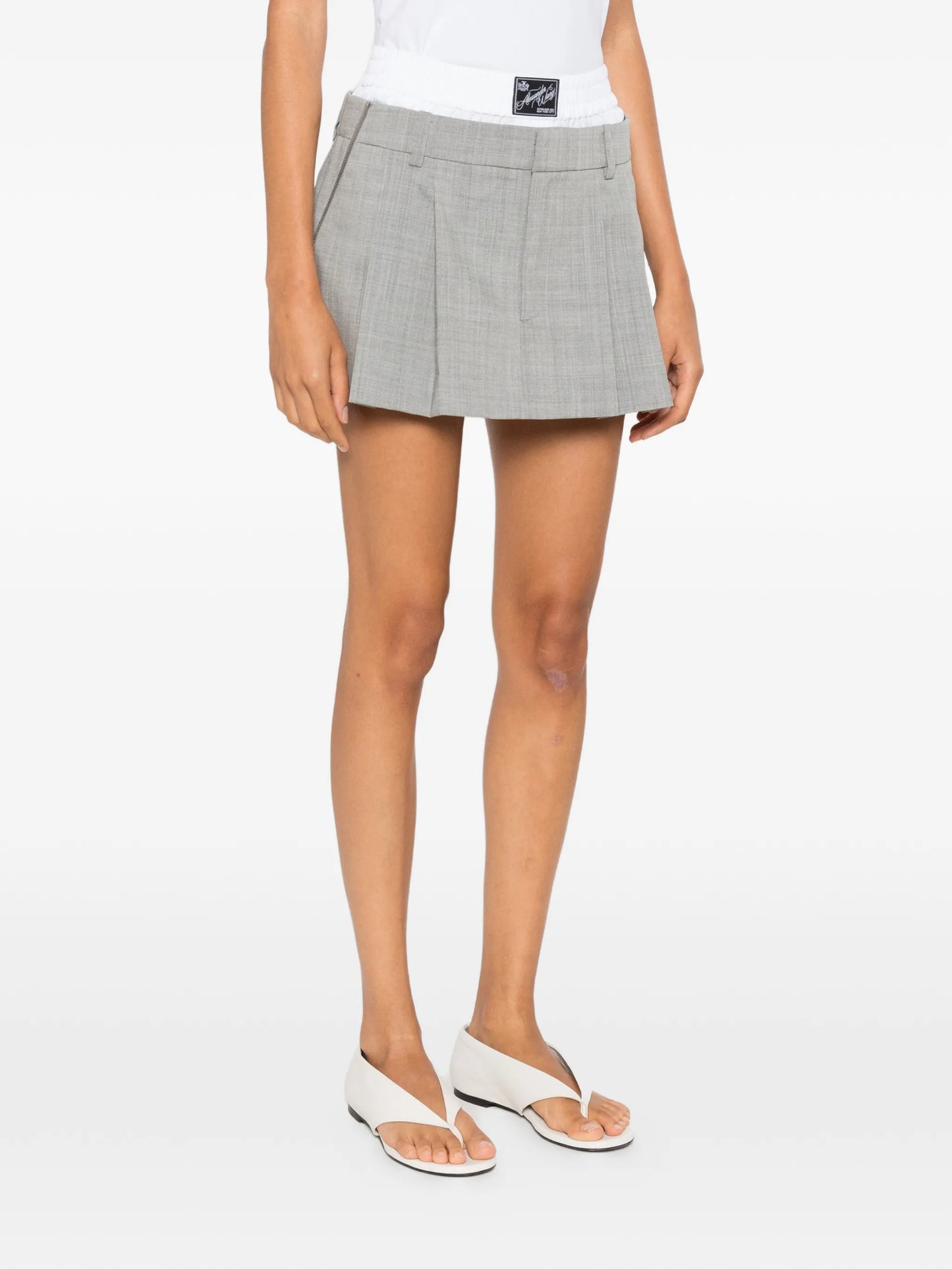 pleated layered-waistband mini skirt
