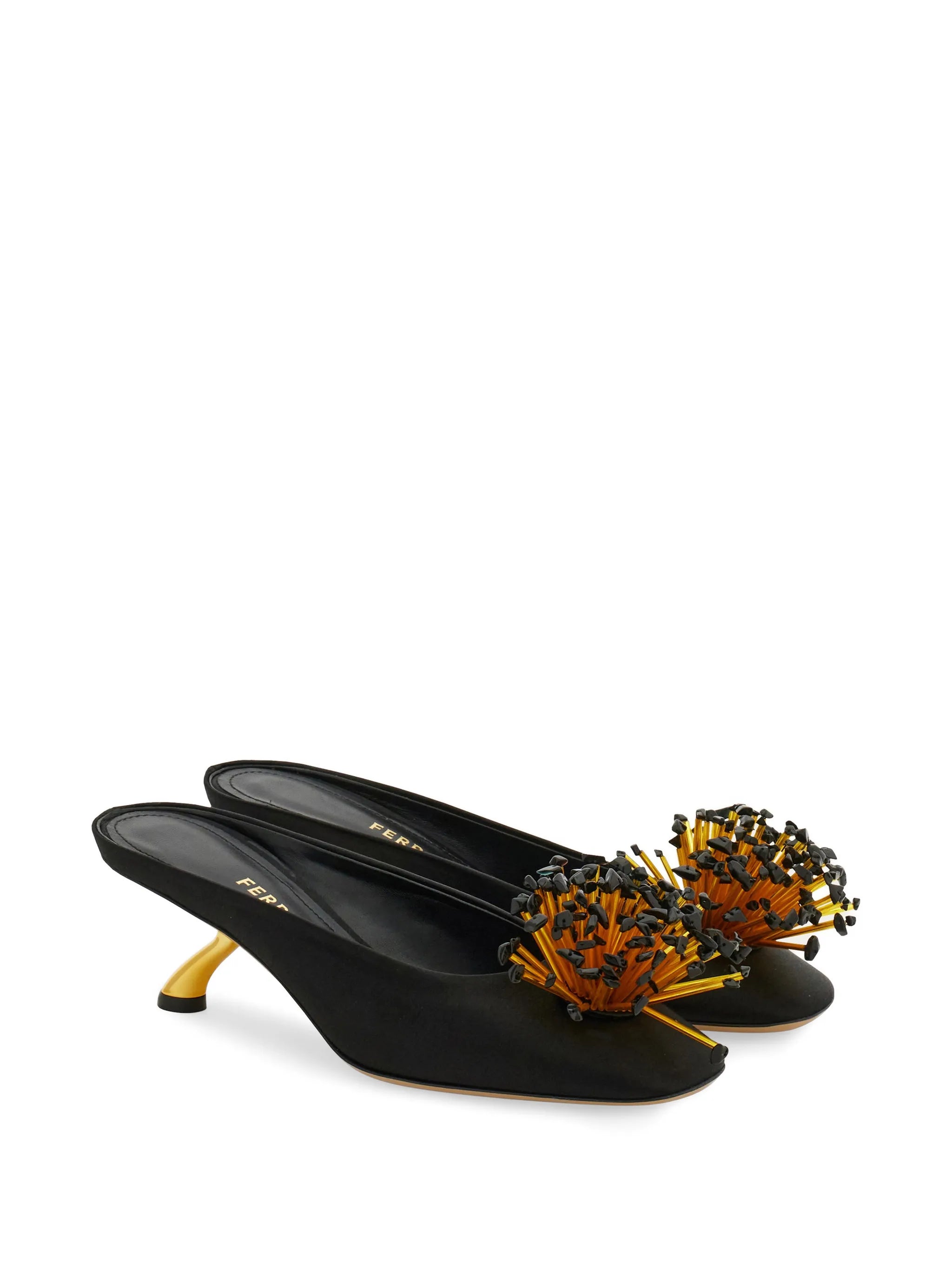 S-shaped heeled mules