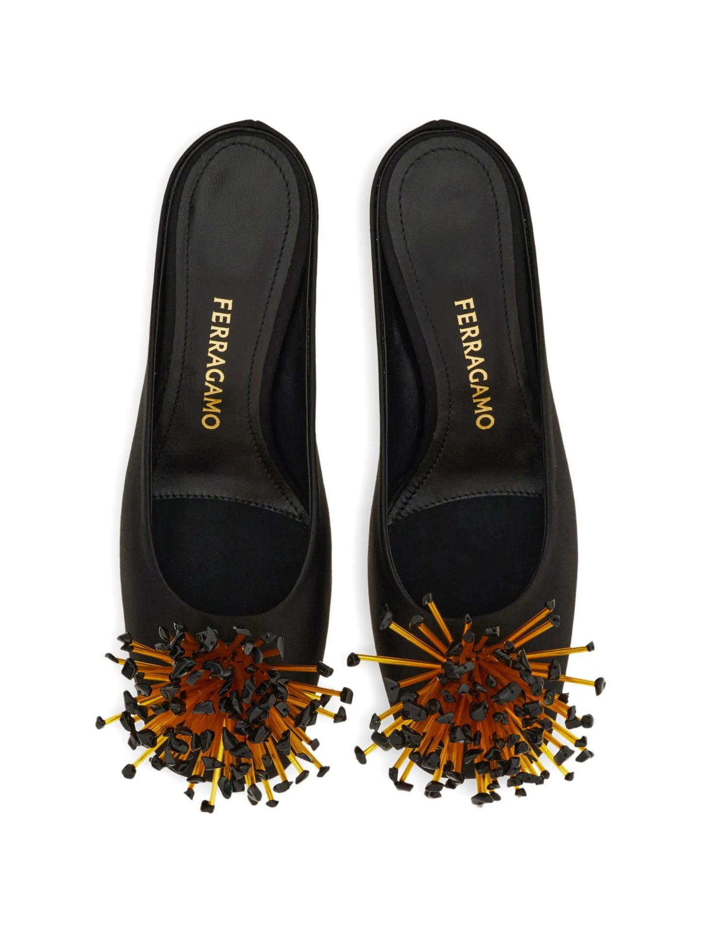 S-shaped heeled mules