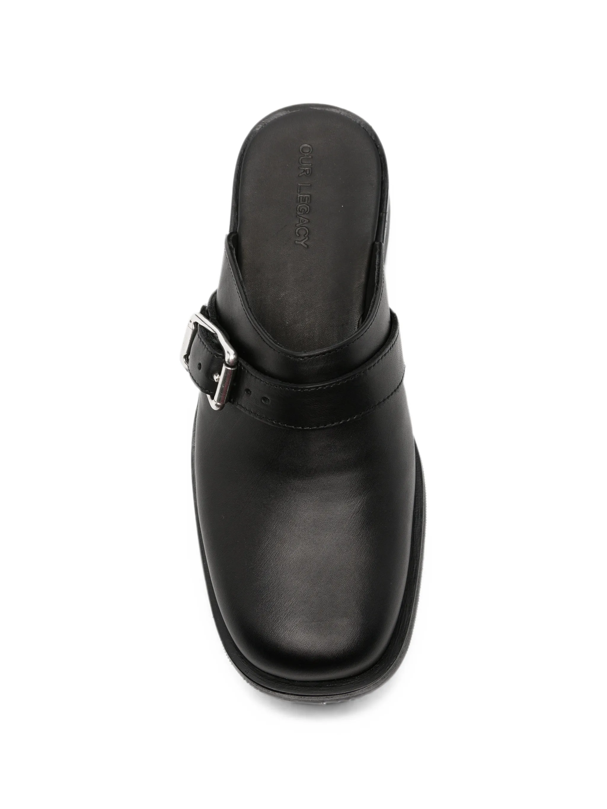 Camion mules in black leather