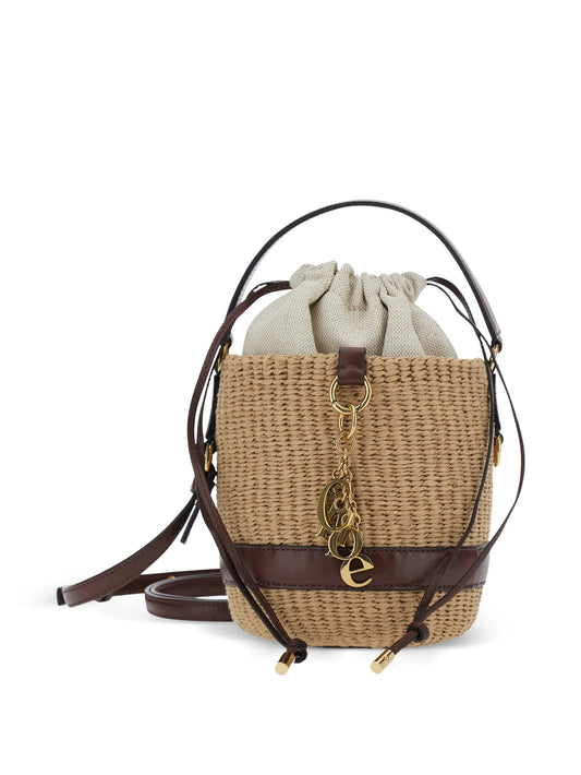 charm-embellished bucket bag