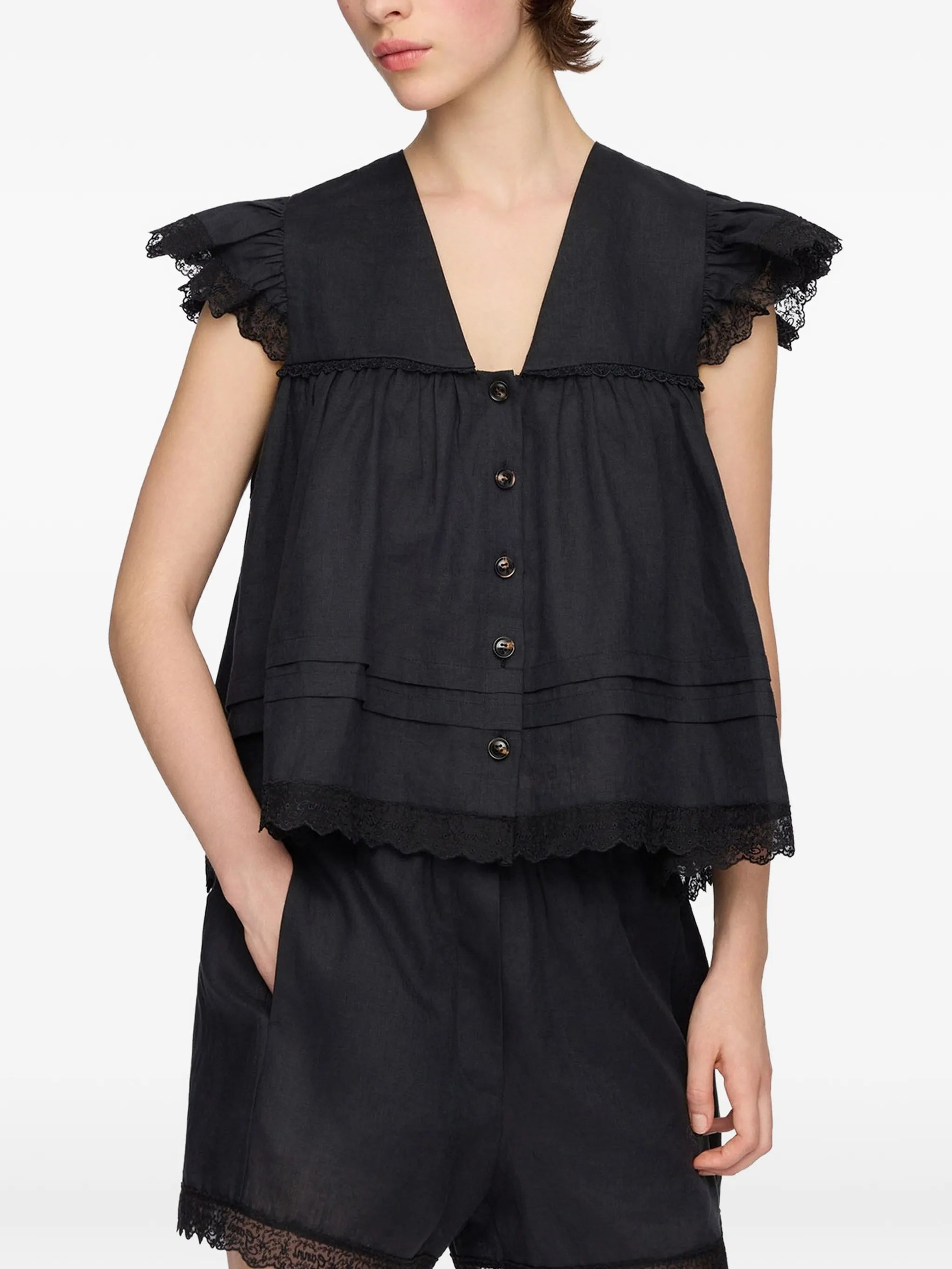 lace-trimmed ruffled blouse