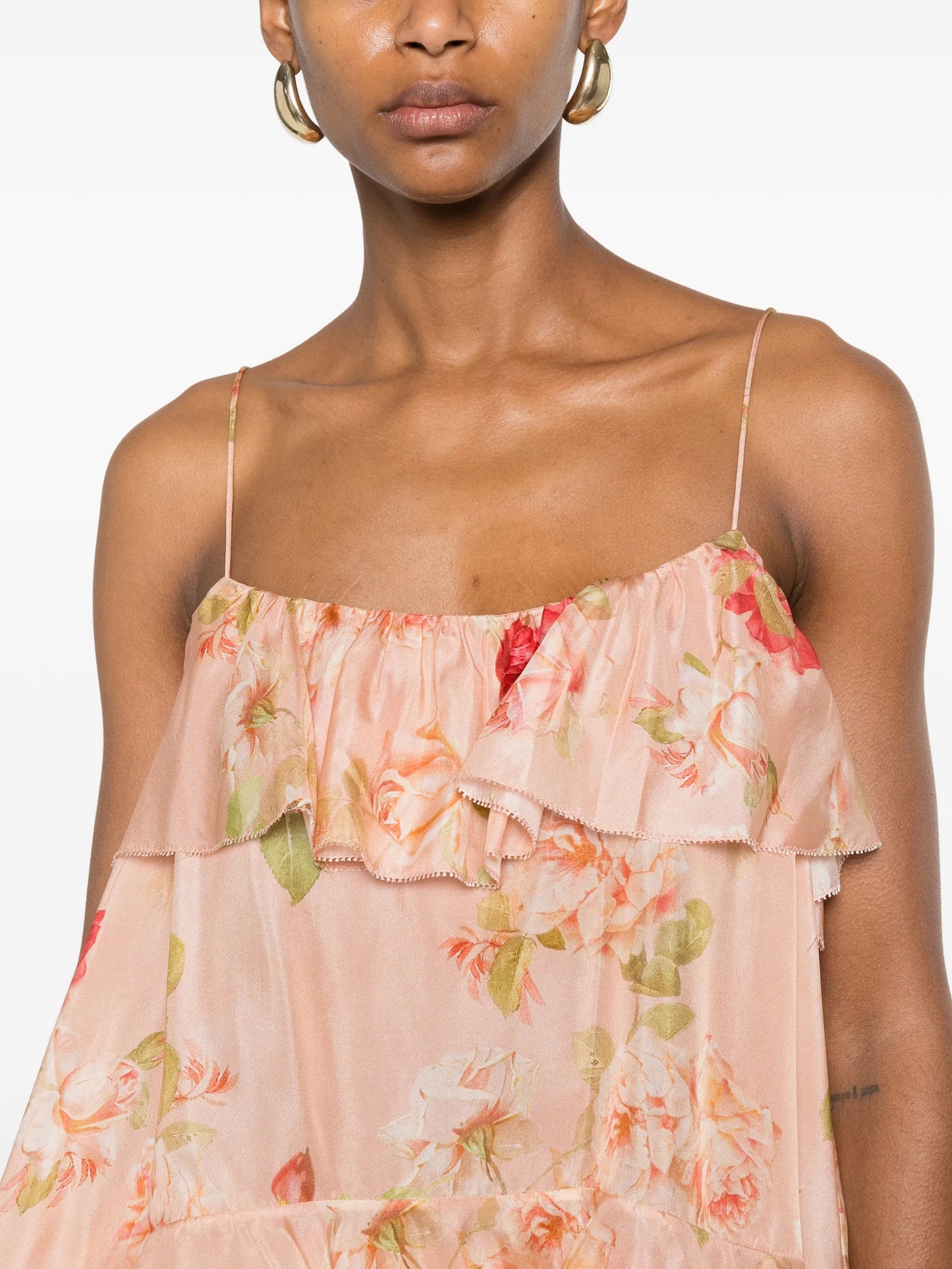 floral-print ruffled top