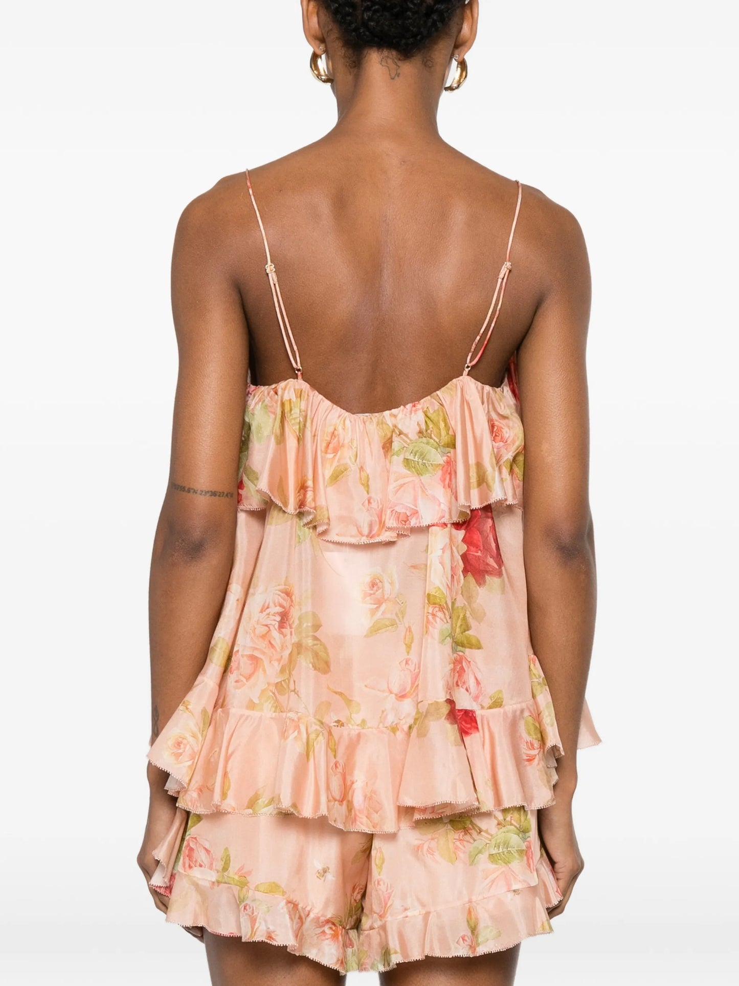 floral-print ruffled top