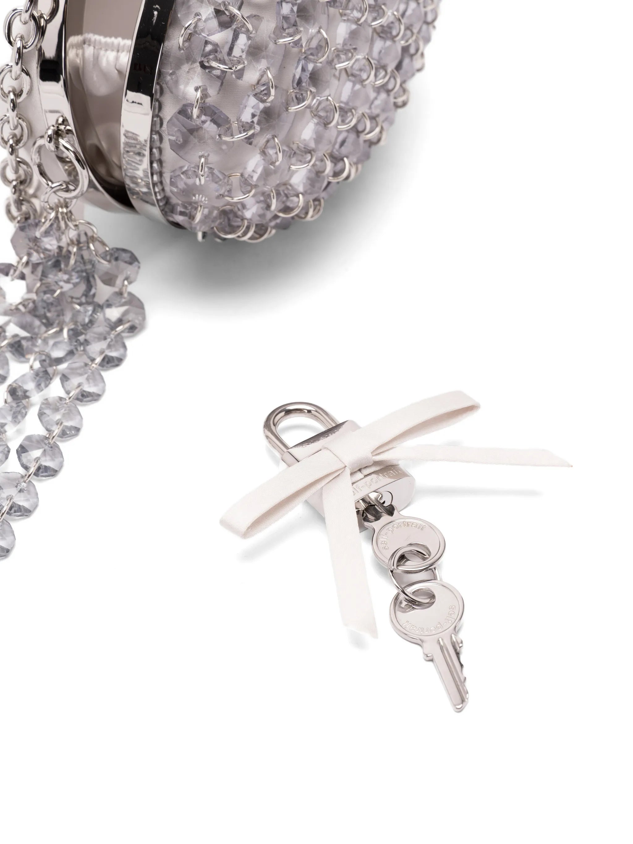 Oval crystal-chain clutch bag