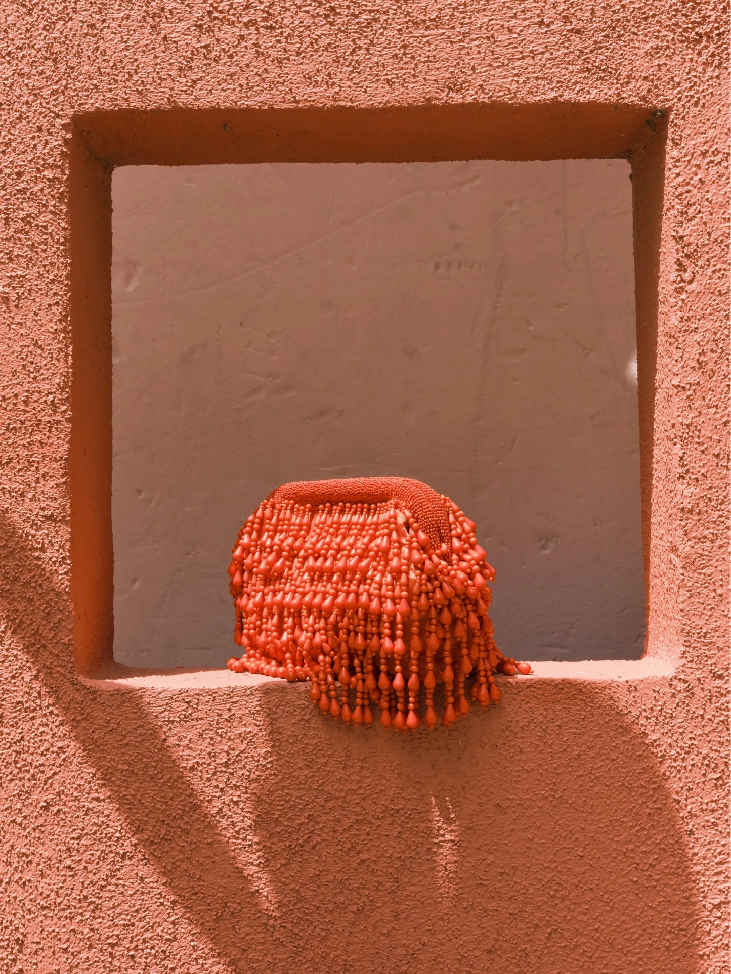 beaded-drop clutch bag