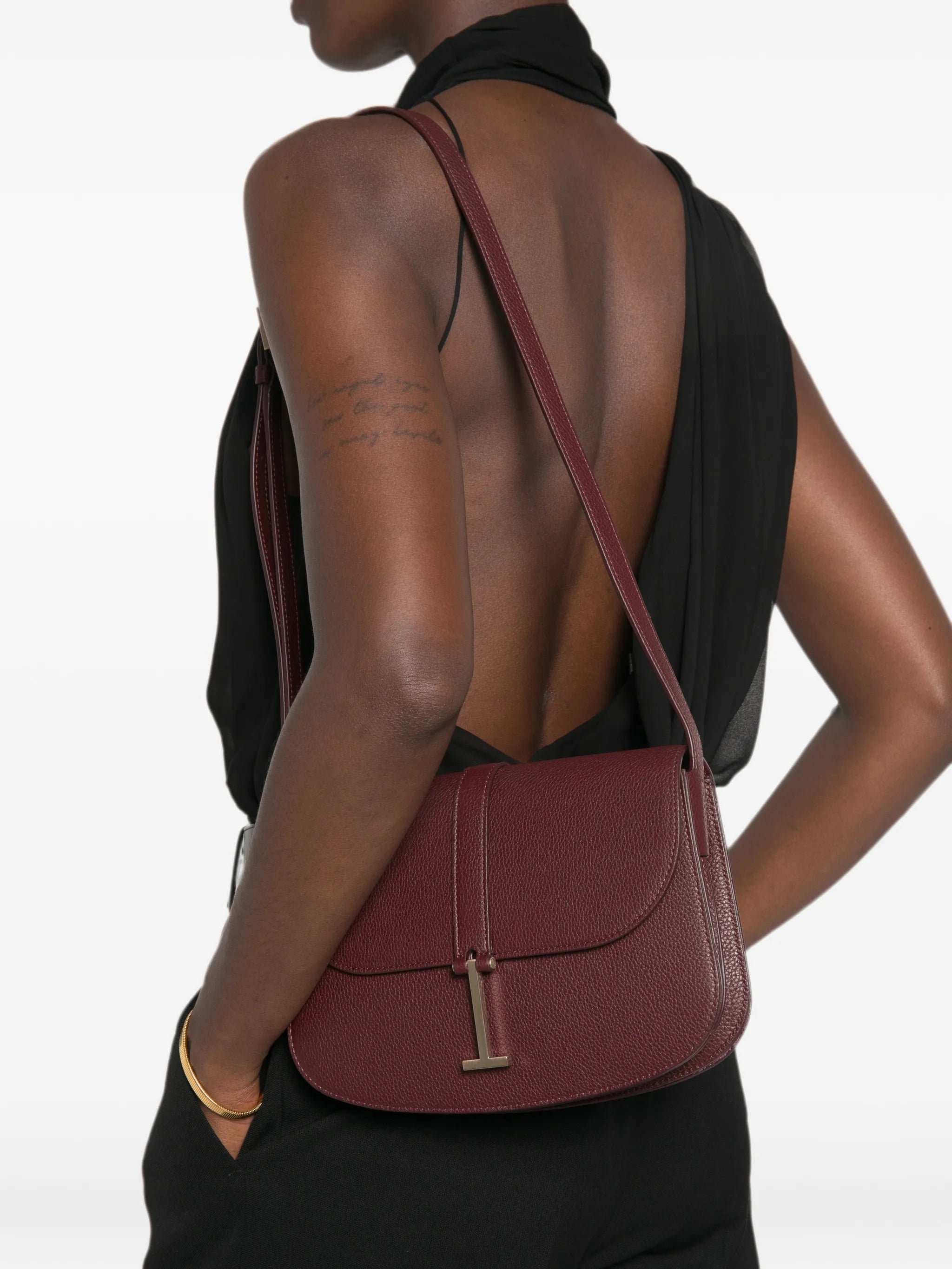 T-clasp grained leather shoulder bag