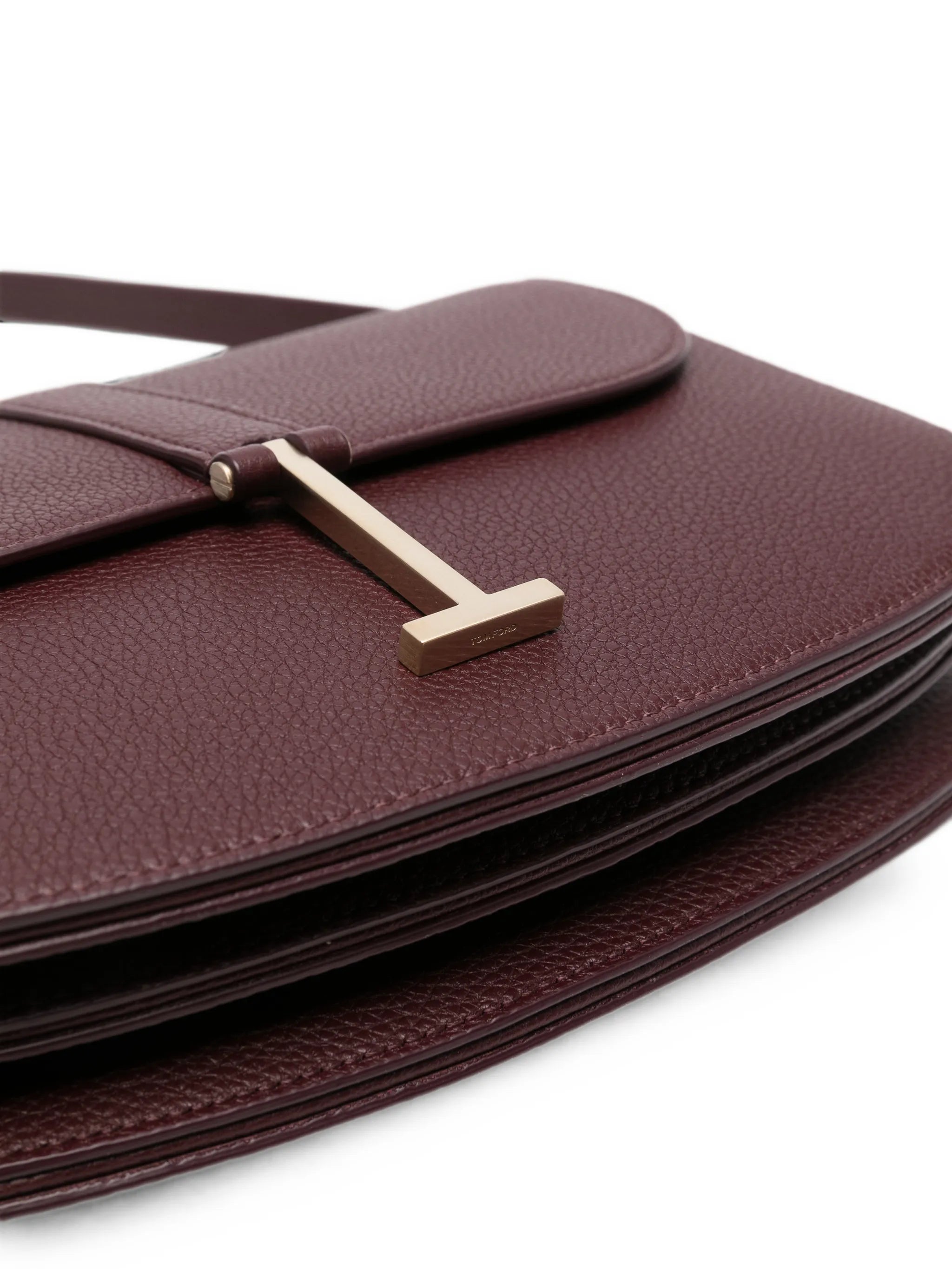 T-clasp grained leather shoulder bag