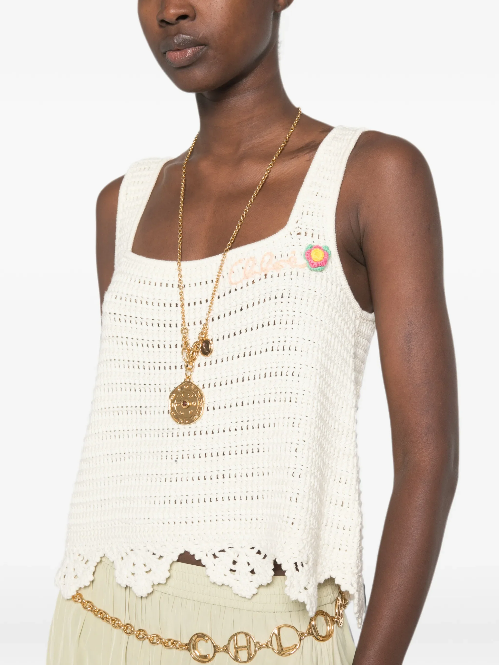 sleeveless cropped top in crochet knit