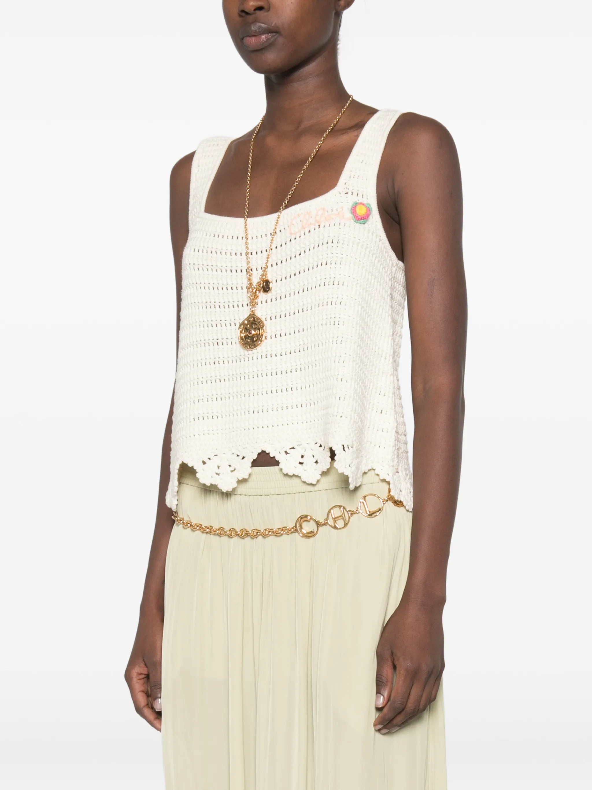 sleeveless cropped top in crochet knit
