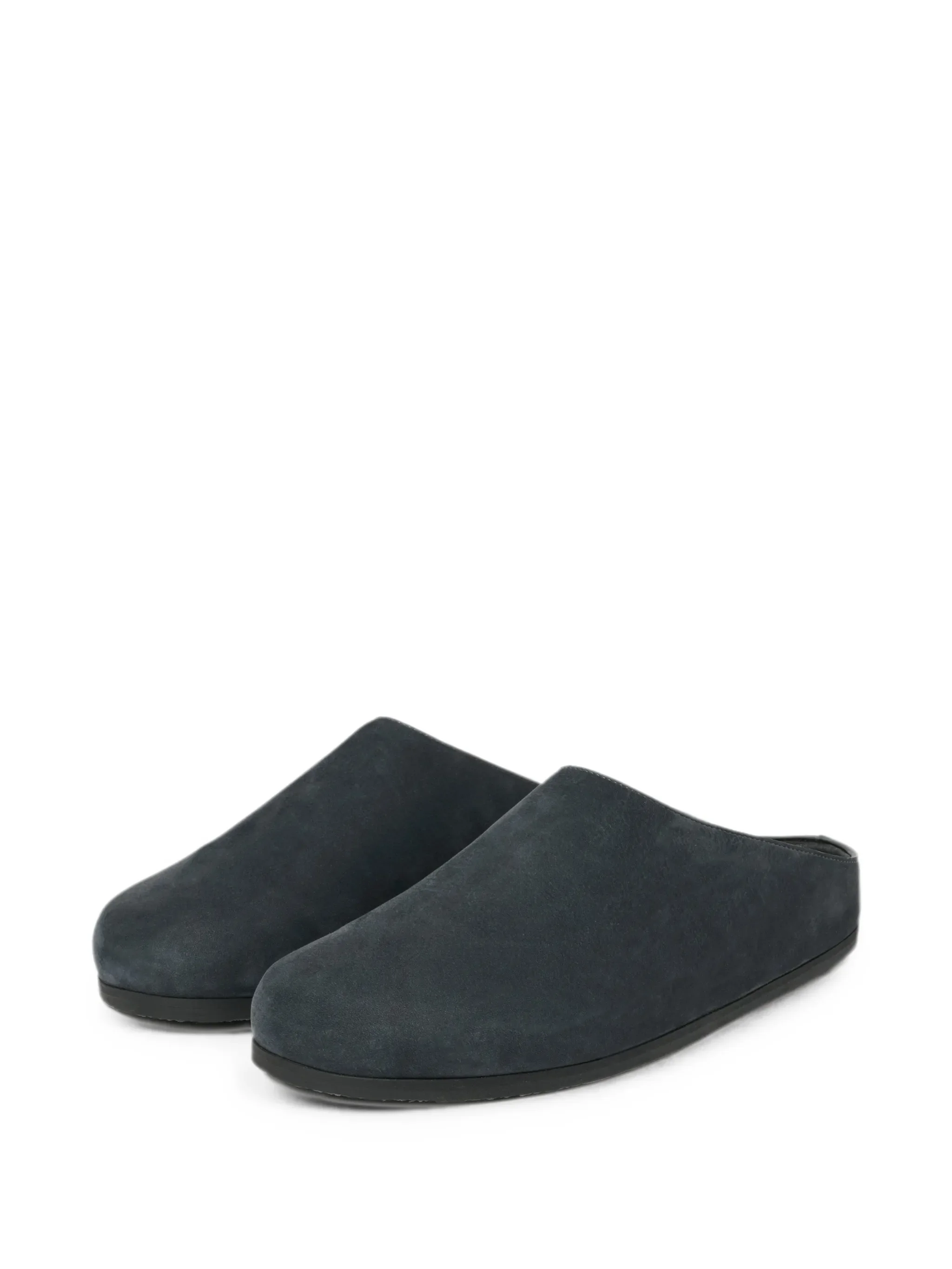 Wearing leather clogs