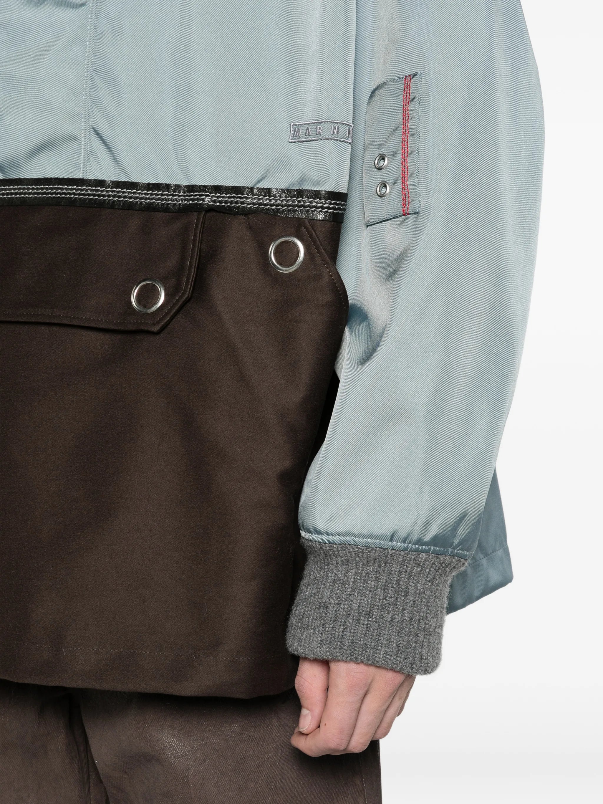 gray nylon half-zip jacket with fur collar